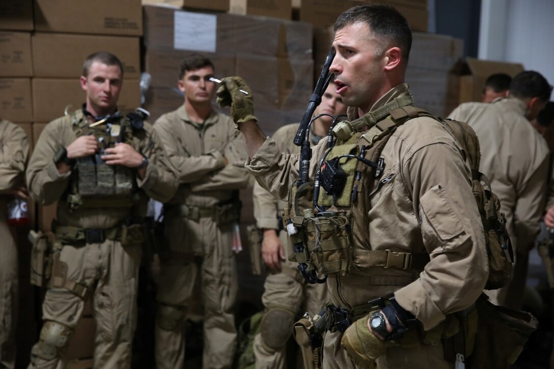 U.S. Marines with the 15th Marine Expeditionary Unit’s Maritime Raid Force conduct a raid during realistic urban training aboard Camp San Luis Obispo, Calif., Dec. 5, 2014. RUT prepares the Marines of the 15th MEU for their upcoming deployment, enhancing their combat skills in environments similar to those they may find in future missions. (U.S. Marine Corps photo by Cpl. Anna Albrecht/Released)