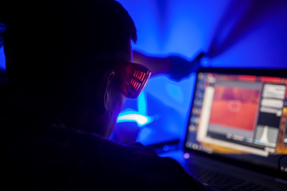 U.S. Marines with the Law Enforcement Detachment, Combat Logistics Battalion 15, 15th Marine Expeditionary Unit, test a cellphone for fingerprints during realistic urban training aboard Fort Hunter Liggett, Calif., Dec. 6, 2014. RUT prepares the 15th MEU Marines for their upcoming deployment, enhancing their combat skills in environments similar to those they may find in future missions. (U.S. Marine Corps photo by Cpl. Elize McKelvey/Released)