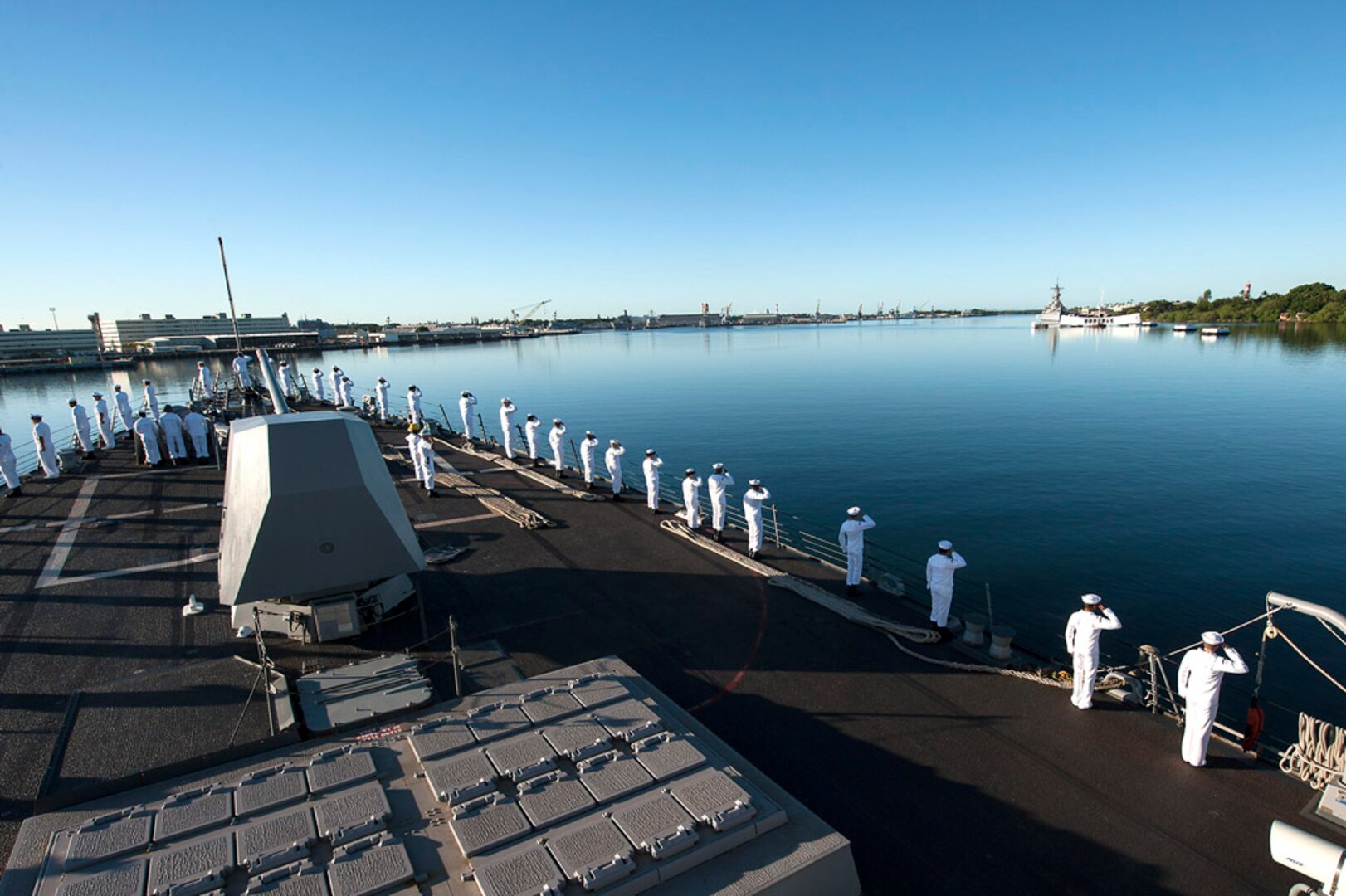 PEARL HARBOR (Dec. 7, 2014) - Sailors aboard the guided-missile destroyer USS Chung-Hoon (DDG 93) conduct a pass-in-review at the USS Arizona Memorial during the 73rd Pearl Harbor Day Commemoration. More than 2,000 guests, including Pearl Harbor survivors and other veterans, attended the National Park Service and U.S. Navy-hosted joint memorial ceremony at the World War II Valor in the Pacific National Monument. (U.S. Navy photo by Mass Communication Specialist 2nd Class Johans Chavarro)  141207-N-IU636-276