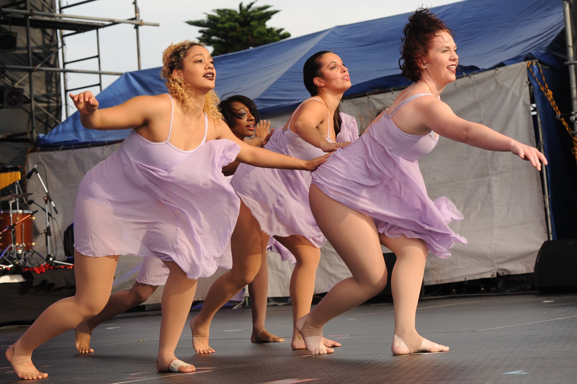 Members of the Capitol Movement Dance Company perform at the Tinsel Town event on Kadena Air Base, Japan, Dec. 6, 2014. Tinsel Town is Kadena's annual holiday celebration offering meet-and-greets with Santa and Mrs. Claus, games, food and free entertainment. (U.S. Air Force photo by Airman 1st Class Zade C. Vadnais/Released)