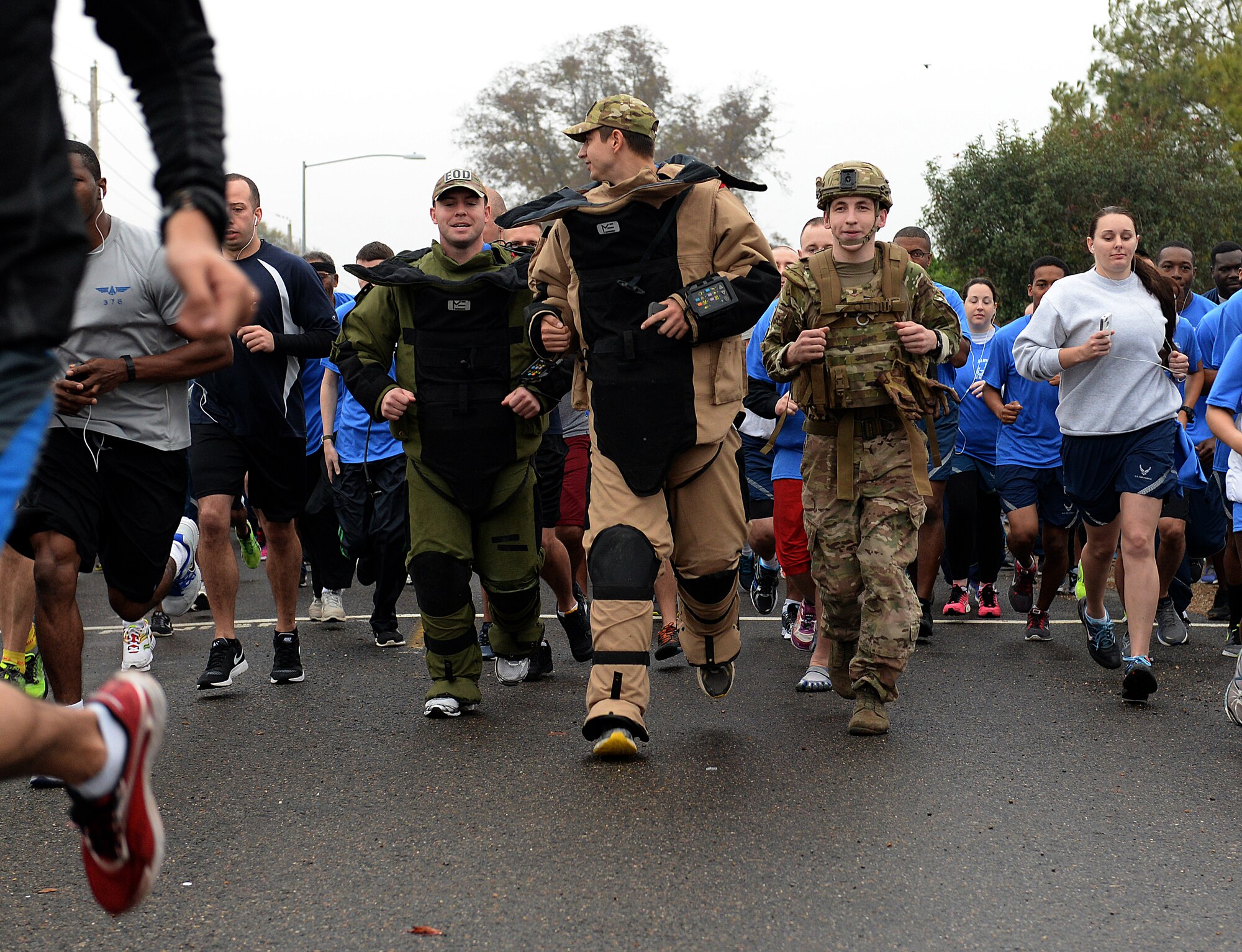 Airmen from the 2nd Civil Engineer Squadron Explosive Ordnance Disposal flight begin the SrA Bryan R. Bell 5K Memorial Run on Barksdale Air Force Base, La., Dec. 5, 2014. Bell, 2 CES EOD technician, tragically lost his life from injuries sustained when his vehicle struck an improvised explosive device while supporting Operation Enduring Freedom in Afghanistan Jan. 5, 2012. (U.S. Air Force photo/Airman 1s Class Curt Beach)