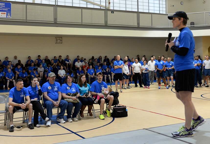 Col. Kristin Goodwin, 2nd Bomb Wing commander, speaks to the Bell family and more than 320 others who came to show support and honor the legacy of fallen Senior Airman Bryan Bell on Barksdale Air Force Base, La., Dec. 5, 2014. More than 320 people gathered to pay tribute to the fallen hero at the Fitness Center named in his honor.  (U.S. Air Force photo/Airman 1st Class Curt Beach)