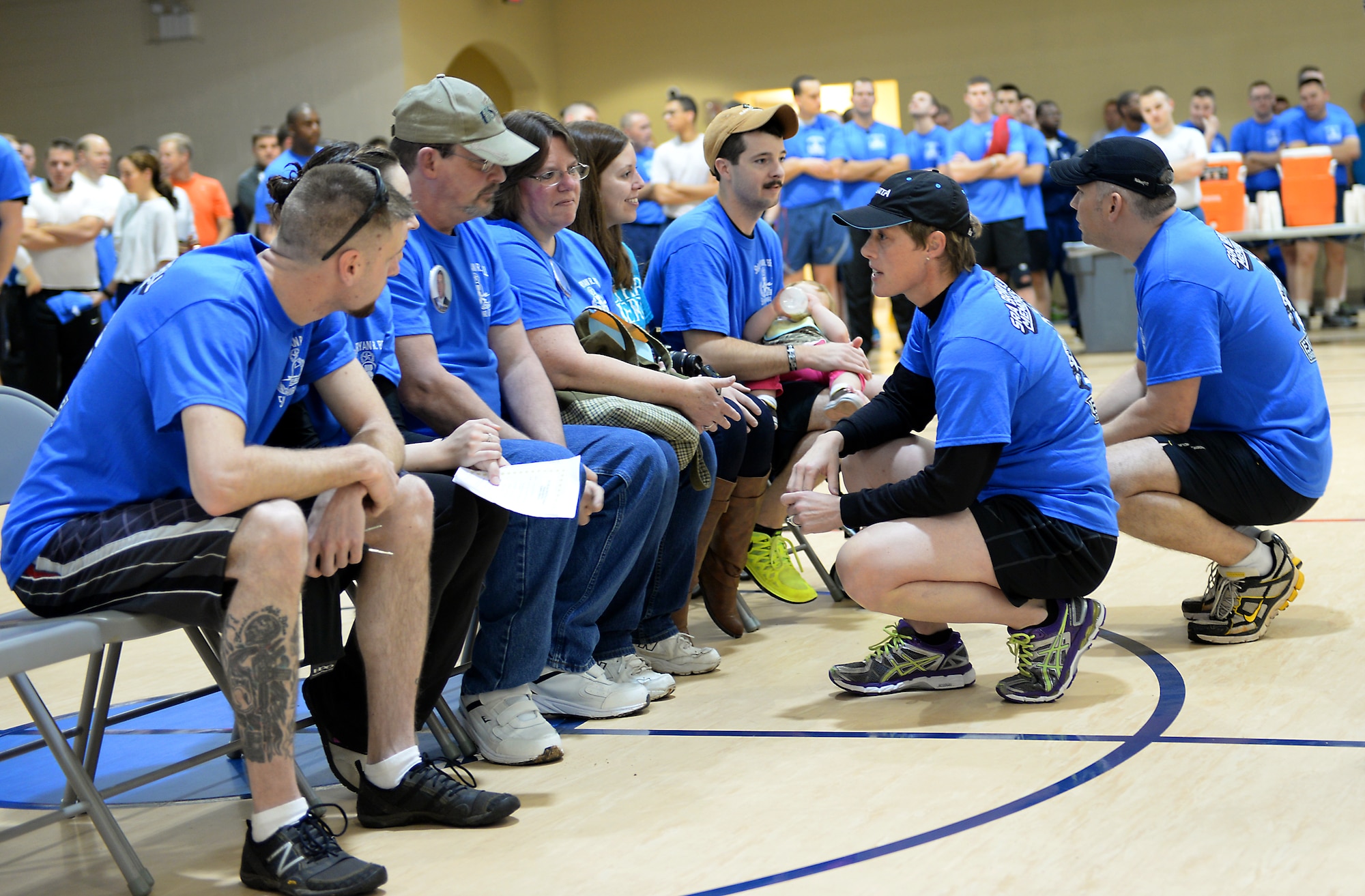 Col. Kristin Goodwin, 2nd Bomb Wing commander, and Chief Master Sgt. Tommy Mazzone, 2nd Bomb Wing command chief, speak with the late Senior Airman Bryan Bell’s family on Barksdale Air Force Base, La., Dec. 5, 2014. More than 320 people gathered to pay tribute to the fallen hero at the fitness center named in his honor. (U.S. Air Force photo/Airman 1st Class Curt Beach)