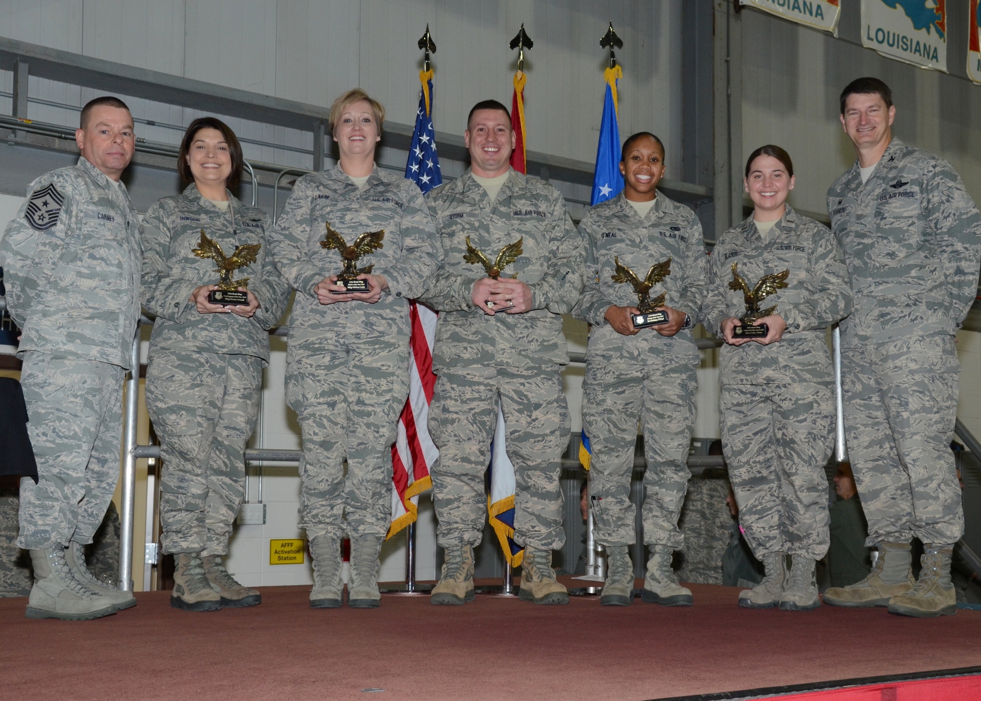 131st Bomb Wing Outstanding Airmen of the Year Awards were presented by the 131st BW commander at the End-of-Year All-Call during December UTA at Whiteman Air Force Base, Mo., Dec. 7, 2014.

Pictured left to right are Chief Master Sgt. Paul Carney, 131st BW Command Chief; 1st Sgt. of the Year Master Sgt. Kirsten Inwood, 131st Medical Group; Senior NCO of the Year Master Sgt. Melissa Lakin, 131st BW Recruiting; NCO of the Year Tech. Sgt. Matt Storm, 131st MDG; Airman of the Year Staff Sgt. Brittany O'Neal, 131st BW Recruiting; Company Grade Officer of the Year 2nd Lt. Ashley Blaser, 157th Air Operations Group; and Col. Michael Francis, 131st BW commander.  Not pictured is Field Grade Officer of the Year Maj. Luke Jayne, 131st Operations Group.

(U.S. Air National Guard photo by Airman 1st Class Halley Burgess)