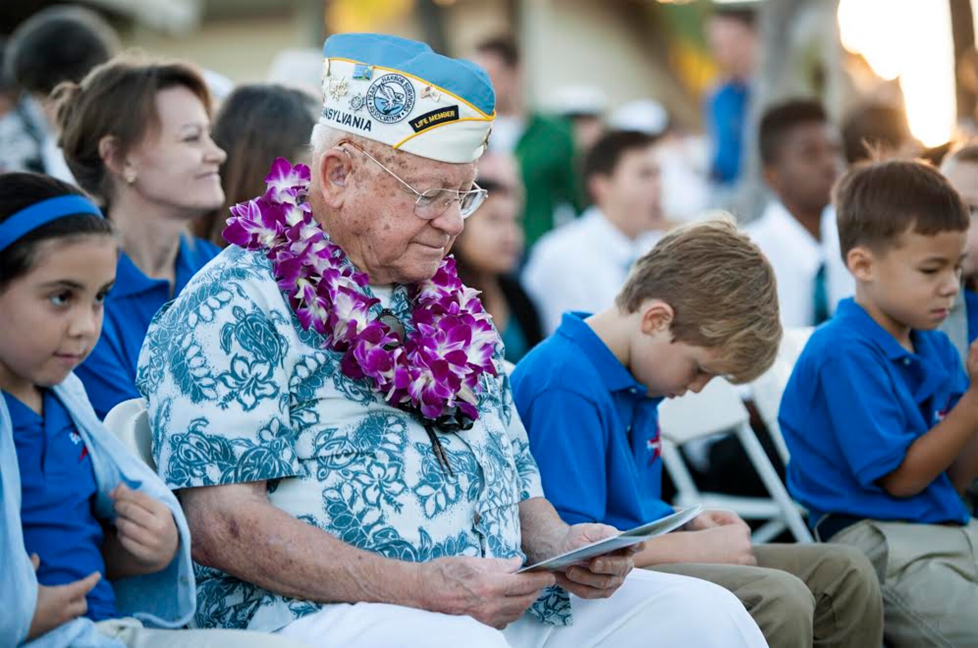 Mickey Ganitch, a Pearl Harbor survivor who was stationed aboard USS Pennsylvania (BB 38), attends the 73rd Anniversary Pearl Harbor Day commemoration ceremony at the Pearl Harbor Visitor Center, Hawaii, Dec. 7, 2014. More than 2,000 guests, including Pearl Harbor survivors and other veterans, attended the National Park Service and U.S. Navy-hosted joint memorial ceremony at the World War II Valor in the Pacific National Monument. This year's theme focused on "Preserving the Memory." (U.S. Navy photo by Mass Communication Specialist 2nd Class Diana Quinlan/Released)
