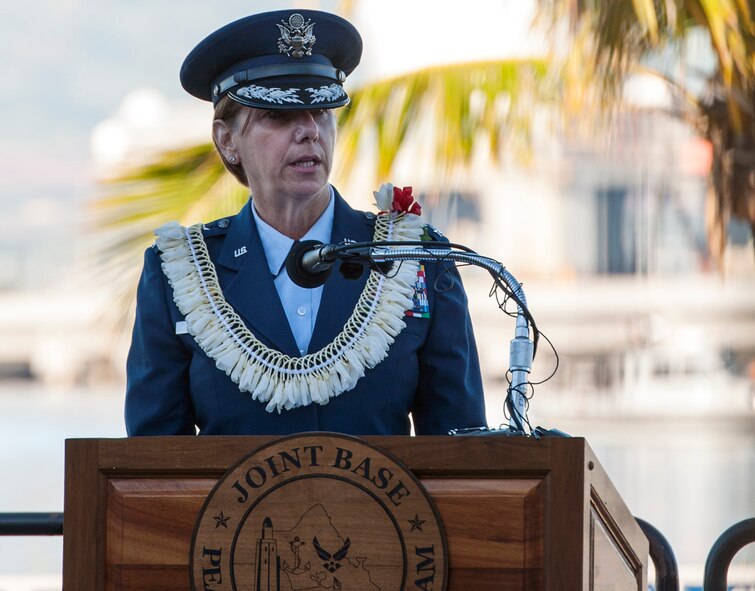 U.S. Air Force Gen. Lori J. Robinson, Commander, Pacific Air Forces, addresses the audience during the 73rd Anniversary Pearl Harbor Day commemoration ceremony at the Pearl Harbor Visitor Center. More than 2,000 guests, including Pearl Harbor survivors and other veterans, attended the National Park Service and U.S. Navy-hosted joint memorial ceremony at the World War II Valor in the Pacific National Monument. This year's theme focused on "Preserving the Memory." (U.S. Navy photo by Mass Communication Specialist 2nd Class Diana Quinlan/Released)