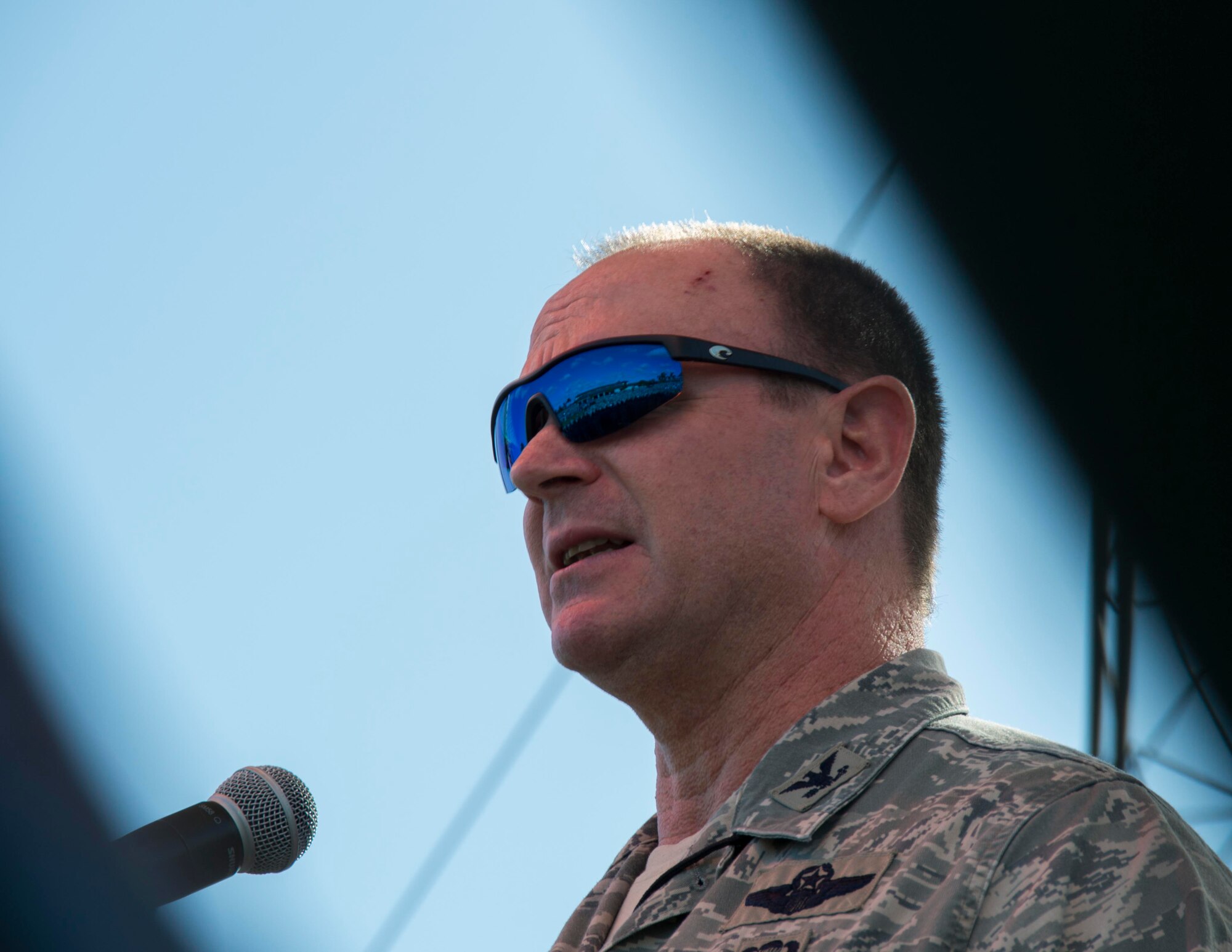 Col. Chris Funk, 482nd Fighter Wing commander, addressed the men and women in his charge during a commander's call at Homestead Air Reserve Base, Fla., Dec. 6. He thanked everyone for their service and dedication to achieving the mission throughout the year and encouraged everyone to continue working together as a team in 2015. (U.S. Air Force photo by Senior Airman Jaimi L. Upthegrove)
