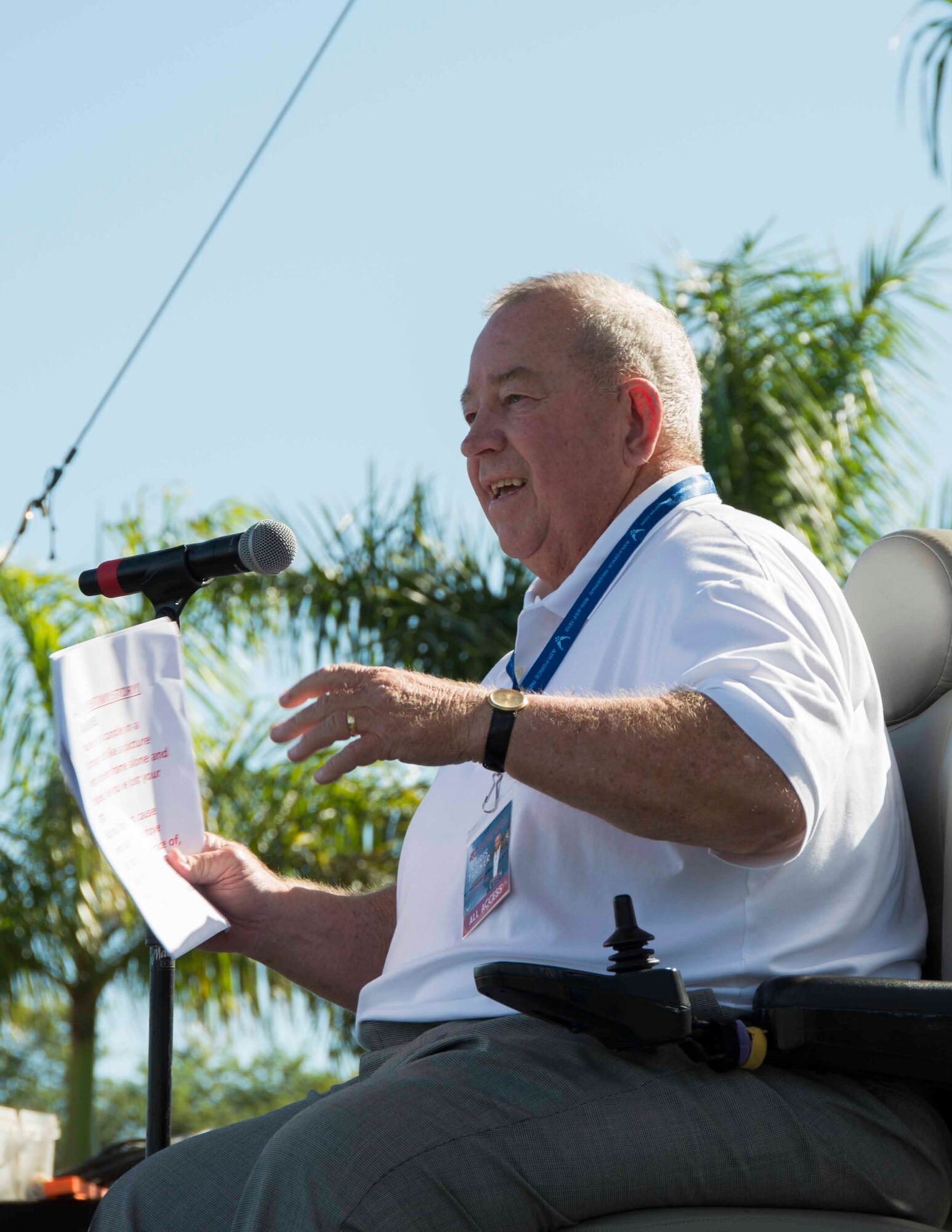Coach Gary Weller addresses members of the 482nd Fighter Wing during a commander's call at Homestead Air Reserve Base, Fla., on Dec. 6. Weller thanked his wife, Kathy, for her love and support and reminded everyone of the importance of family, especially during the holiday season. (U.S. Air Force photo by Senior Airman Jaimi L. Upthegrove)