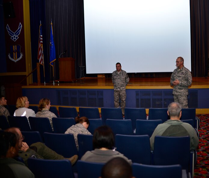 Col. Steven Parker, commander, 914th Airlift Wing and Chief Master Sgt. Clint Ronan hold a town hall meeting at the Niagara Falls Air Reserve Station Theatre, December 6, 2014. The town hall meeting allowed members of the wing to ask questions in an informal setting. (U.S. Air Force photo be Staff Sgt. Stephanie Sawyer)