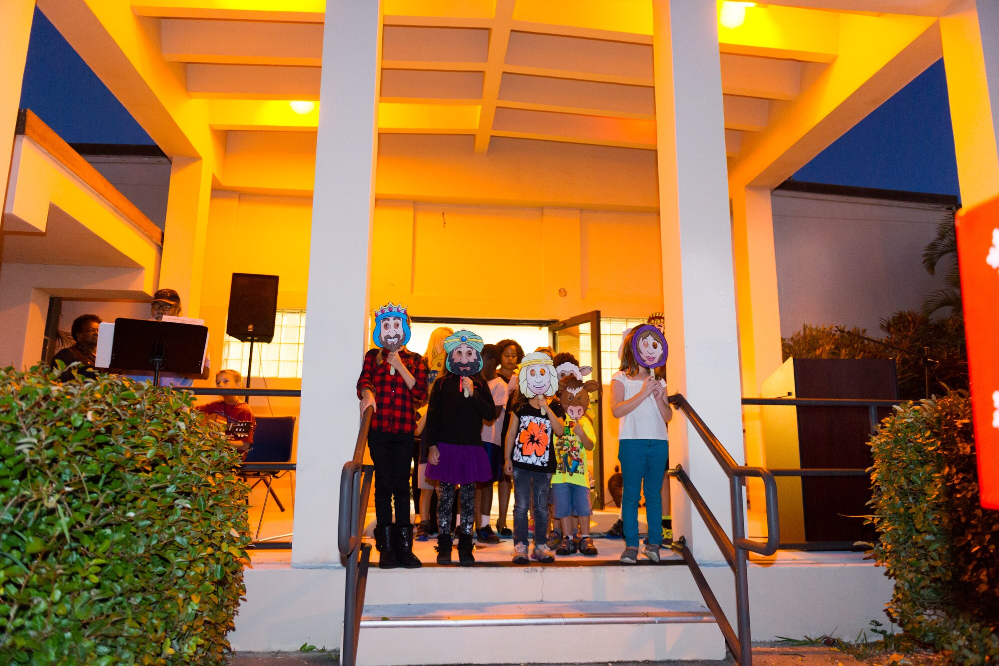 Members of Team Patrick-Cape attended a tree lighting ceremony at the Patrick Air Force Base Seaside Chapel, Dec. 3, 2014, in Fla. In addition to the lighting ceremony, attendees sang carols, ate refreshments, and socialized. (U.S. Air Force photo/Cory Long)