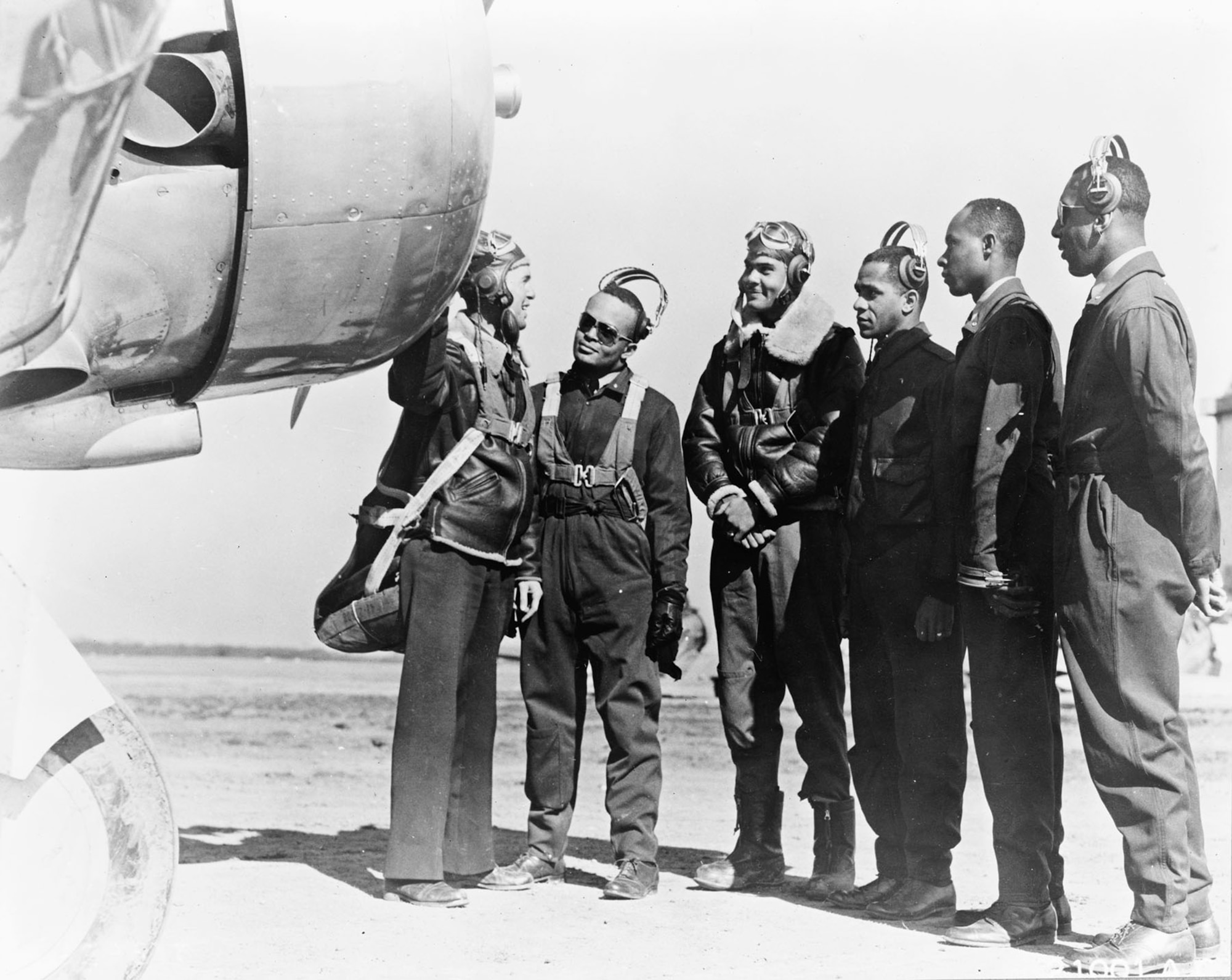 The first five fighter pilots graduated from Tuskegee on March 7, 1942. From left to right are R.M. Long (instructor); George Roberts; Benjamin O. Davis Jr.; Charles DeBow; Mac Ross; and Lemuel Curtis. (U.S. Air Force photo)