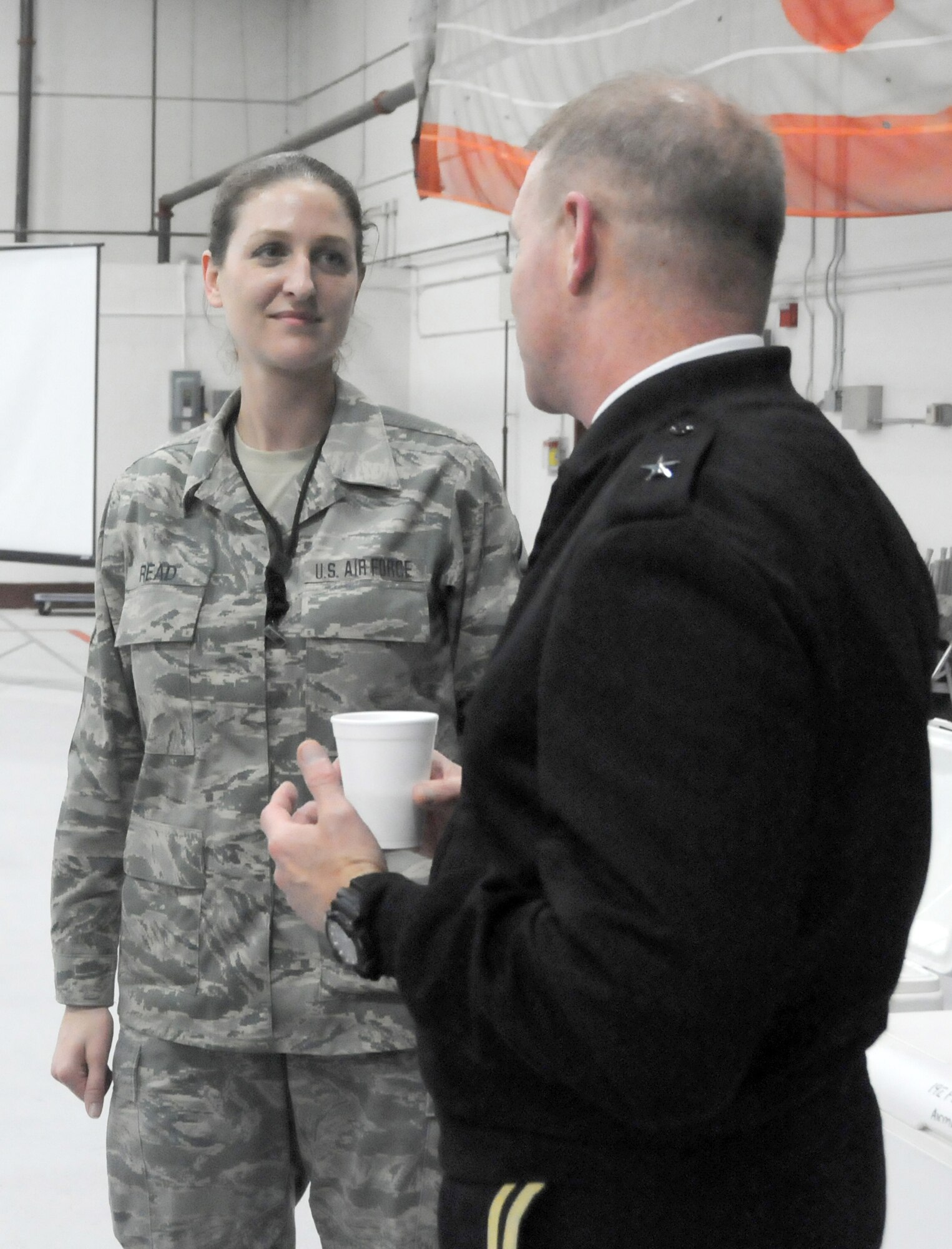 Brig. Gen. Timothy P. Williams, the Adjutant General of Virginia, meets with Airmen from the 192D Fighter Wing during the Wing’s third annual holiday celebration and awards event on December 6, 2014, at Langley Air Force Base. Williams congratulated award recipients, thanked members for their service and wished them a safe and happy holiday season.  (U.S. Air National Guard photo by Master Sgt. Carlos J. Claudio/Released)
