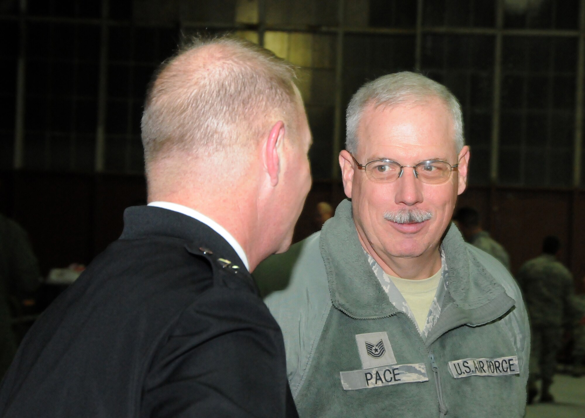 Brig. Gen. Timothy P. Williams, the Adjutant General of Virginia, meets with Airmen from the 192D Fighter Wing during the Wing’s third annual holiday celebration and awards event on December 6, 2014, at Langley Air Force Base. Williams congratulated award recipients, thanked members for their service and wished them a safe and happy holiday season.  (U.S. Air National Guard photo by Master Sgt. Carlos J. Claudio/Released)