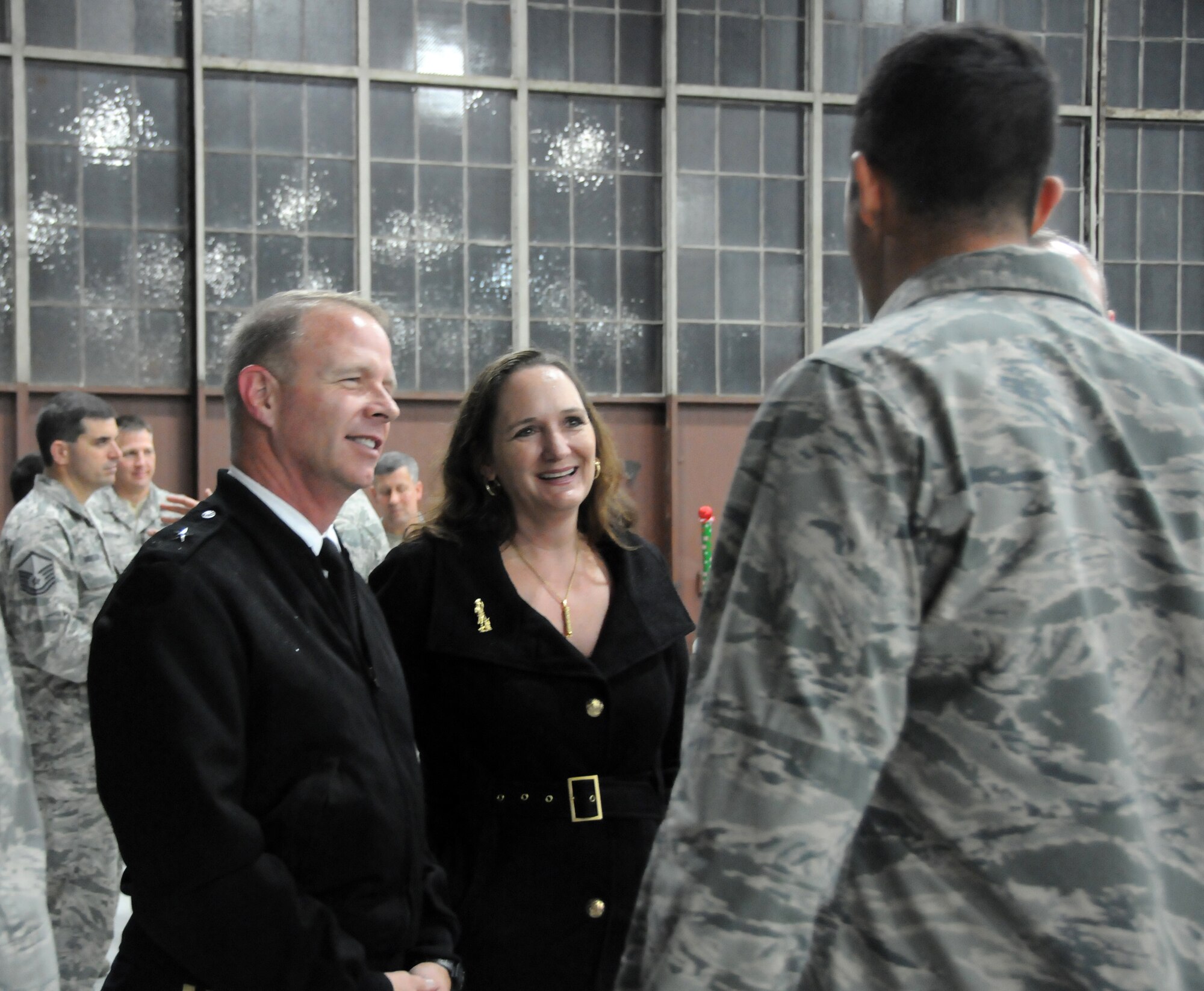Brig. Gen. Timothy P. Williams, the Adjutant General of Virginia and wife Cheryl, meet with Airmen from the 192D Fighter Wing during the Wing’s third annual holiday celebration and awards event on December 6, 2014, at Langley Air Force Base. Williams and his wife congratulated award recipients, thanked members for their service and wished them a safe and happy holiday season.  (U.S. Air National Guard photo by Master Sgt. Carlos J. Claudio/Released)