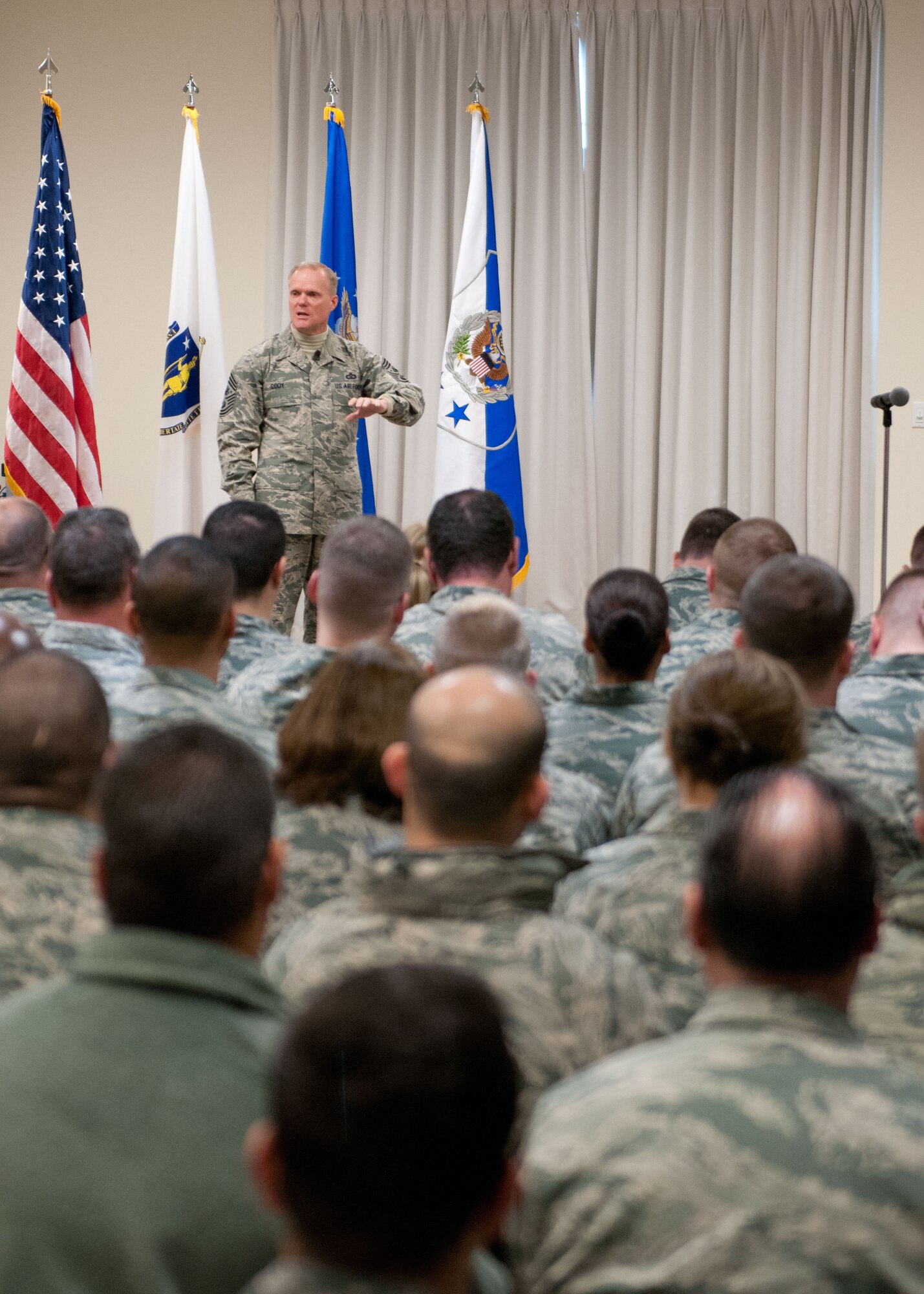Chief Master Sgt. of the Air Force James A. Cody talks with 102nd Intelligence Wing airmen during an all-call on Otis Air National Guard Base Nov. 20, 2014. Cody is the first Chief Master Sgt. of the Air Force to visit the base. During his day-long visit Cody learned about the wing’s history, listened to airmen’s concerns, and shared his perspective on a variety of issues affecting the enlisted force. (National Guard photo/Master Sgt. Aaron Smith)