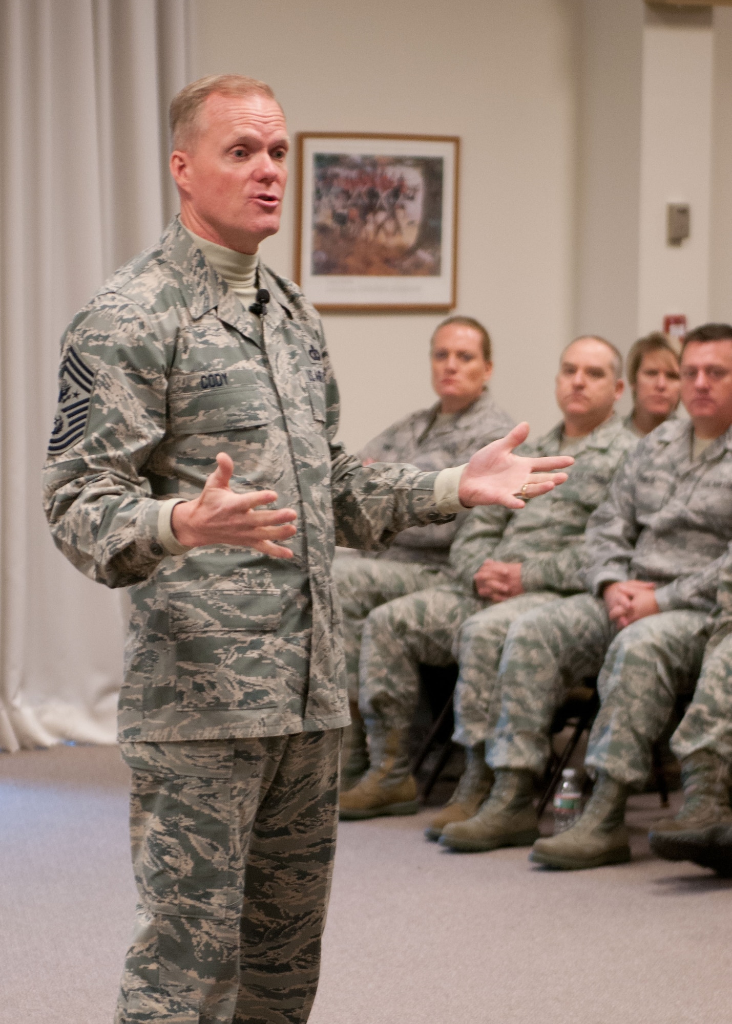 Chief Master Sgt. of the Air Force James A. Cody talks with 102nd Intelligence Wing airmen during an all-call on Otis Air National Guard Base Nov. 20, 2014. Cody is the first Chief Master Sgt. of the Air Force to visit the base. During his day-long visit Cody learned about the wing’s history, listened to airmen’s concerns, and shared his perspective on a variety of issues affecting the enlisted force. (National Guard photo/Master Sgt. Aaron Smith)