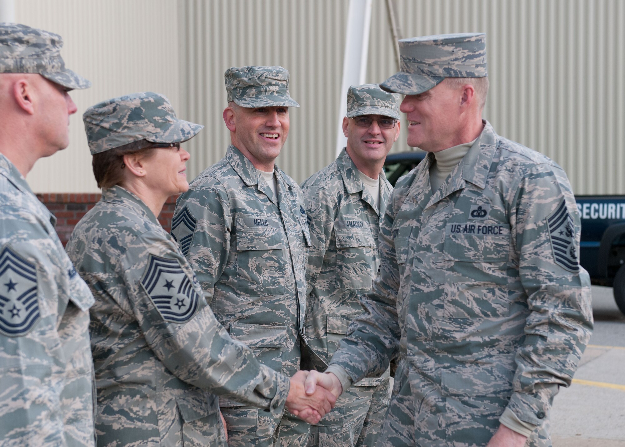 102nd Intelligence Wing Command Chief Master Sgt. Karen Cozza shakes hands with Chief Master Sgt. of the Air Force James A. Cody as he arrives at Otis Air National Guard Base on Nov. 20, 2014. Cody is the first Chief Master Sgt. of the Air Force to visit the base. During his day-long visit Cody learned about the wing’s history, listened to airmen’s concerns, and shared his perspective on a variety of issues affecting the enlisted force.