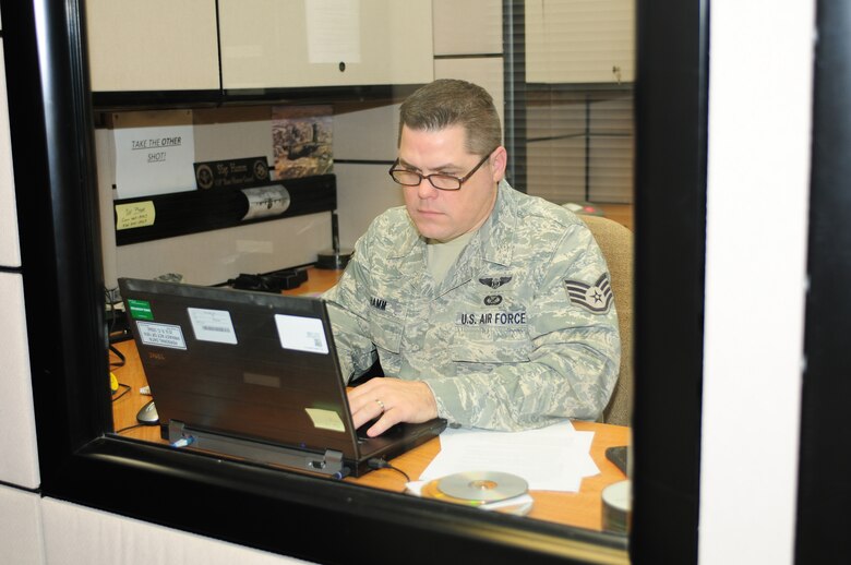 BERRY FIELD AIR NATIONAL GUARD BASE, Tenn. - Staff Sgt. Darrell Hamm attends a distance news writing course here Dec. 7, 2014, to enhance his career abilities as a photojournalist for the 118th Wing, Tennessee Air National Guard. (U.S. Air National Guard photo by Staff Sgt. Krista Hair/ Released)