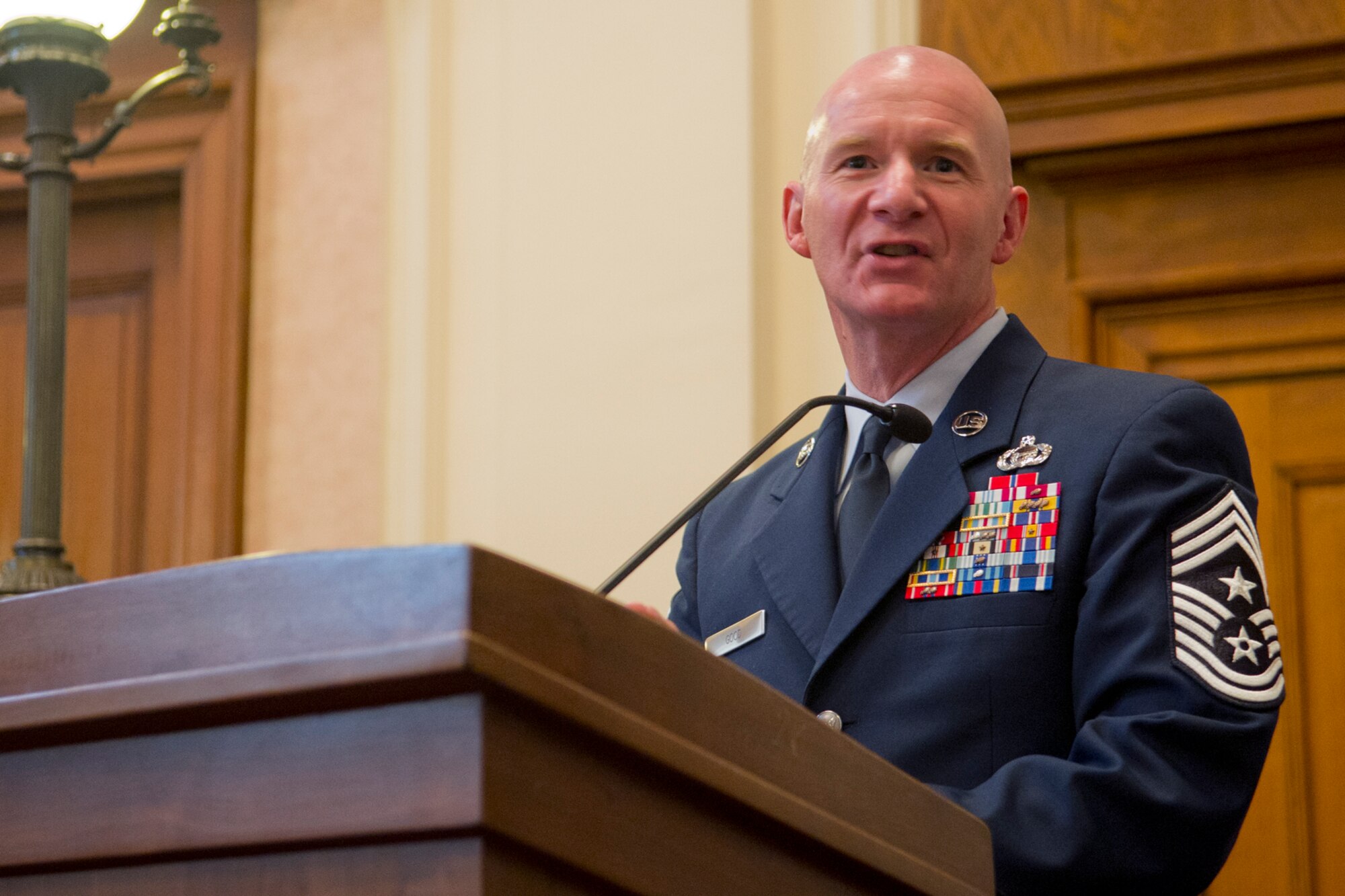 SAN ANGELO, Texas -- Chief Master Sgt. Thomas F. Good, 17th Training Wing Command Chief, speaks at a naturalization ceremony in the O. C. Fisher Federal Building Dec. 3. Good is a naturalized citizen who hails from Scotland. (U.S. Air Force photo/ Staff Sgt. Laura R. McFarlane)