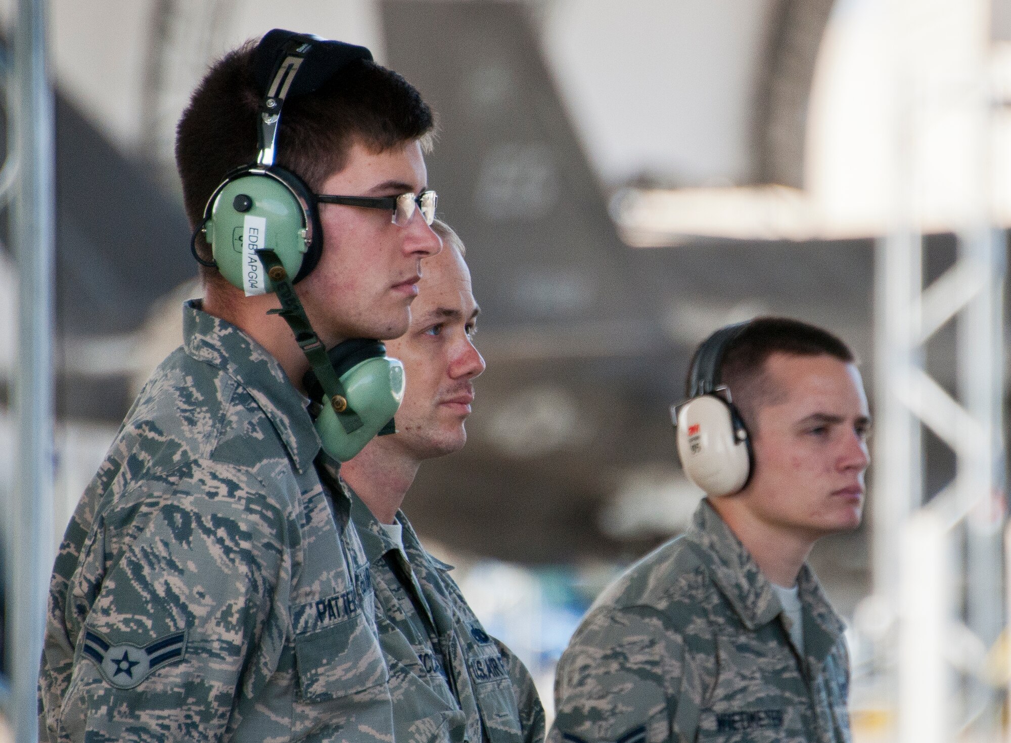 Airman 1st Class John Patterson, Tech. Sgt. James McCallen and Airman 1st Class Jake Wiedmeyer, 33rd Maintenance Group, stand at the ready during preflight checks prior to an F-35A Lightning II morning sortie at Eglin Air Force Base, Fla. The 33rd Maintenance Group is responsible for the maintenance of the Air Force’s joint strike fighter fleet on base. (U.S. Air Force photo/Samuel King Jr.)