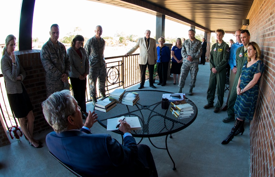 The Honorable George W. Bush, 43rd President of the United States, discusses his motivation for writing his recent book to Team Moody leadership Dec. 4, 2014, at Moody Air Force Base, Ga. Bush explained that the book highlights his relationship with his father and how it affected his decisions as president. (U.S. Air Force photo by Airman 1st Class Ceaira Tinsley/Released)