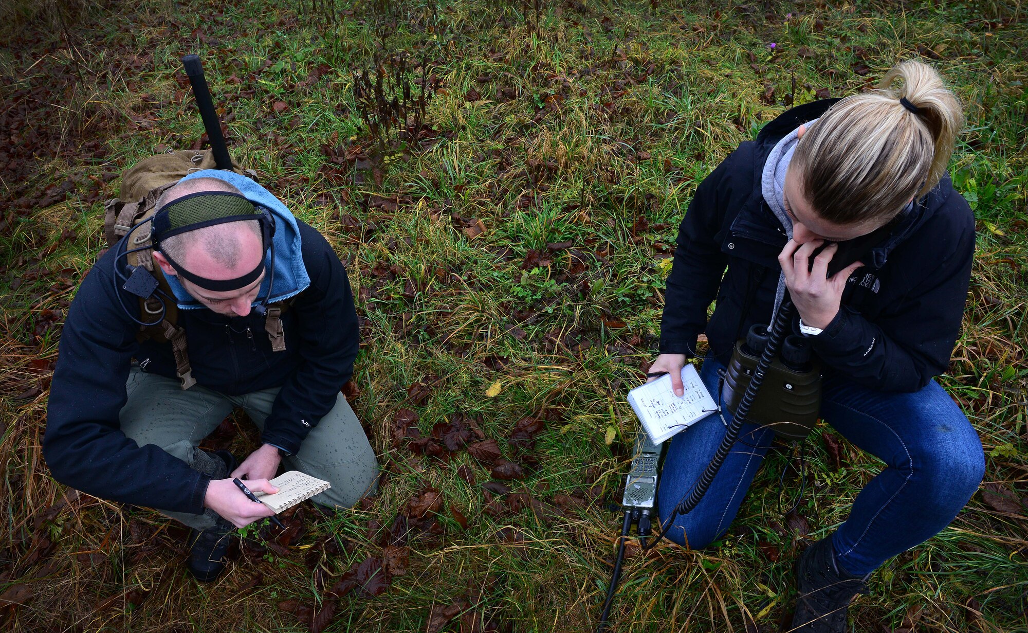 Royal Netherlands army joint tactical air controllers read coordinates to an F-16 Fighting Falcon pilot, Dec. 4, 2014, in Barcis, Italy. Trained in all types of warfare, JTACs are proficient in a variety of technology, a range of weaponry, and can advise and support ground commanders. (U.S. Air Force photo/Senior Airman Matthew Lotz)