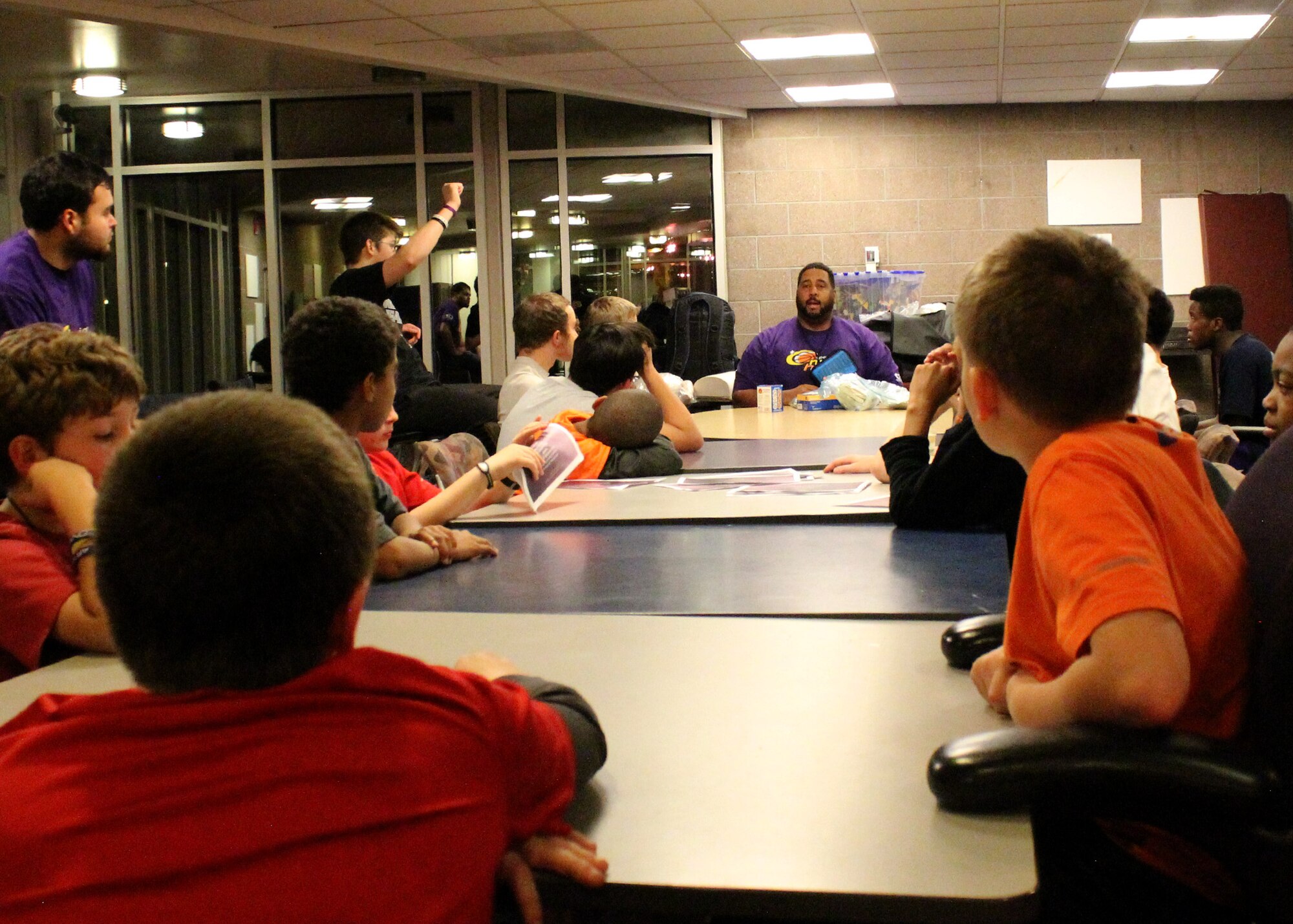 PETERSON AIR FORCE BASE, Colo. -- Young men ages nine to 18 years old participate in the Passport to Manhood lock-in at the R.P. Lee Youth Center, Nov. 21. Passport to Manhood is a Boys and Girls Club of America program that allows young men to participate in activities and discussions that encourage good behavior and good moral choices as they progress in their lives going from pre-teen to teen years. (Courtesy photo by Kyle Hanchett)
