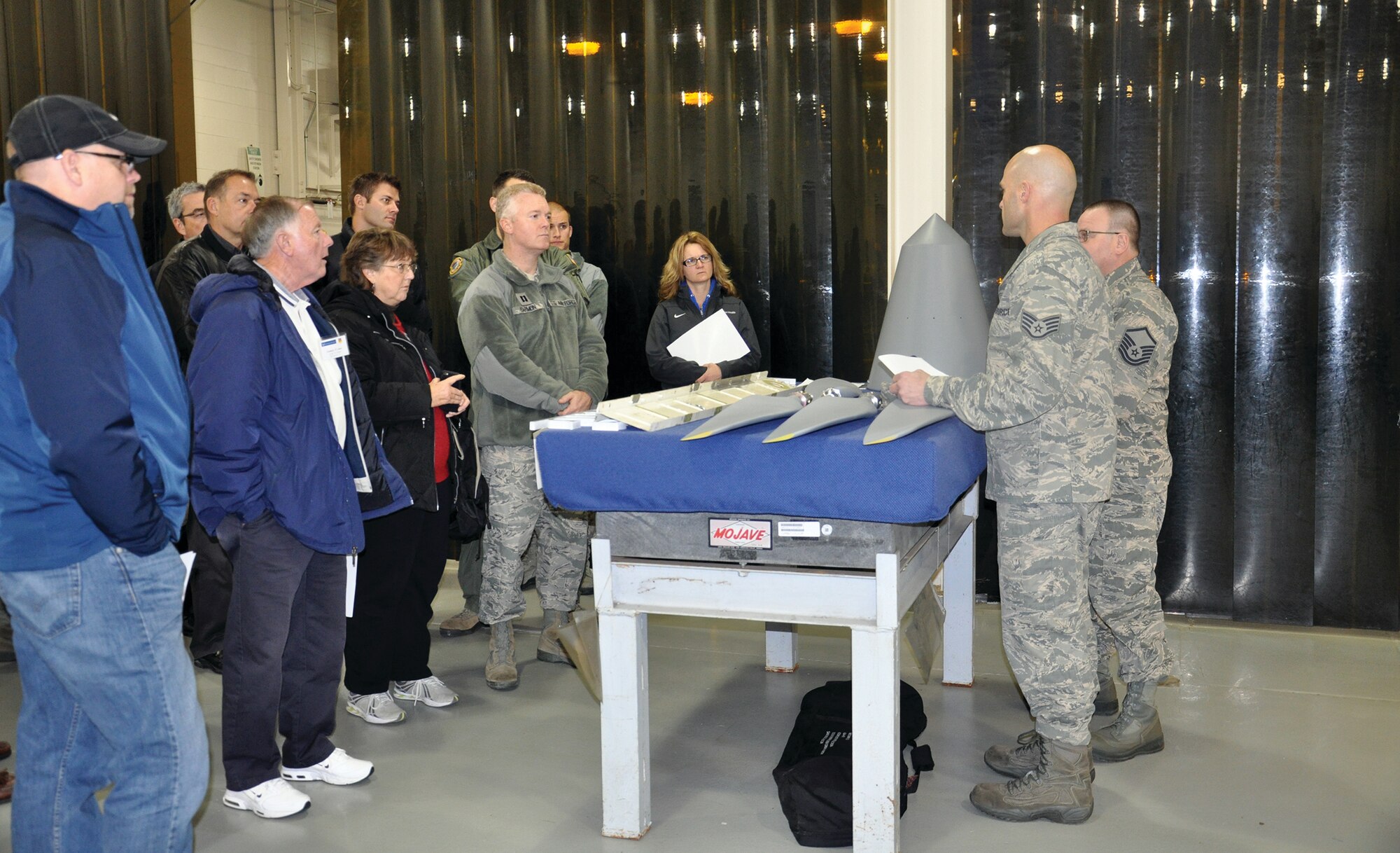WRIGHT-PATTERSON AIR FORCE BASE, Ohio - Employers participating in the 445th Airlift Wing’s annual Employer Appreciation Day Nov. 1, 2014, had the opportunity to tour the 445th Maintenance Squadron's Fabrication Flight. The employers and their reservists were treated to a demonstration and learned the various aspects of fabricating aircraft parts and graphics used for the wing's C-17 Globemaster III. (U.S. Air Force photo/Stacy Vaughn)