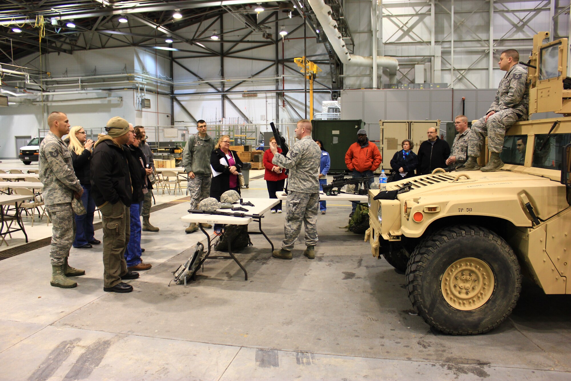 WRIGHT-PATTERSON AIR FORCE BASE, Ohio - Employers participating in the 445th Airlift Wing’s annual Employer Appreciation Day Nov. 1, 2014, visit with 445th Security Forces Squadron Airmen and learn about the equipment they use on a day-today basis. (U.S. Air Force photo/Tech. Sgt. Patrick O'Reilly)