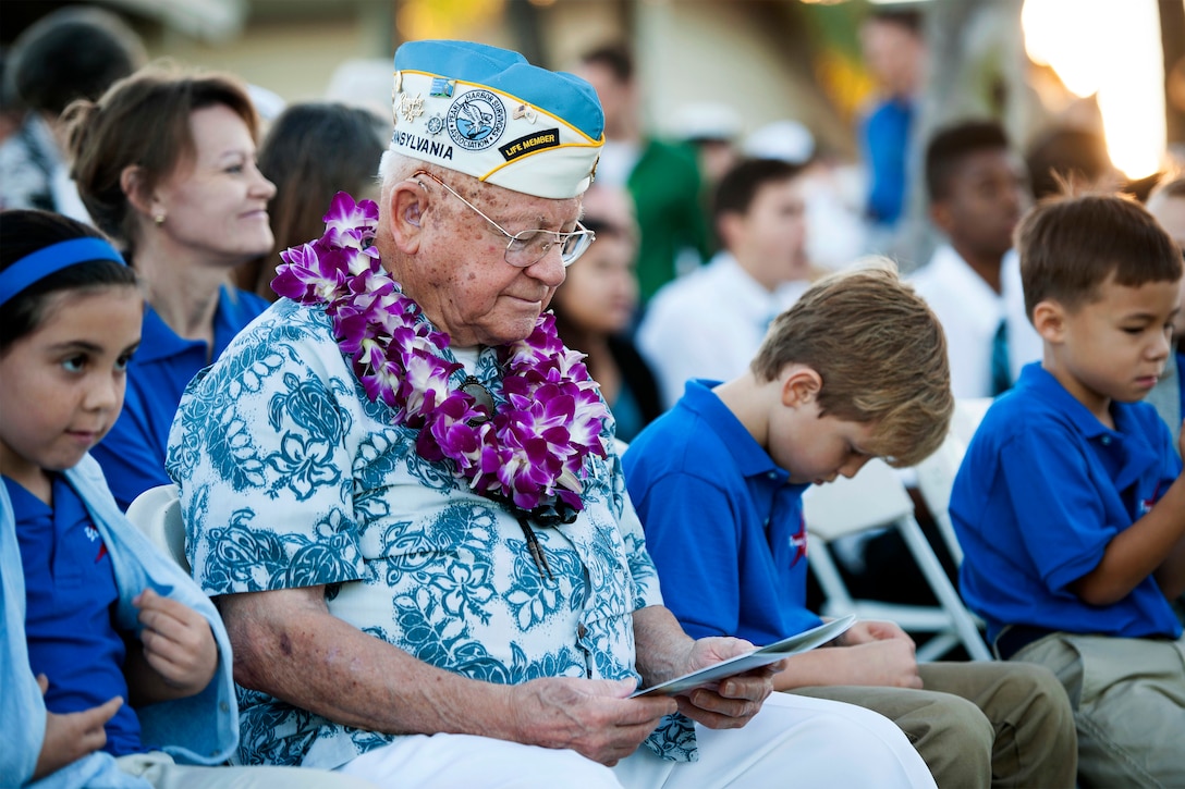 Mickey Ganitch, a Pearl Harbor survivor who was stationed aboard USS Pennsylvania, attends the 73rd Anniversary Pearl Harbor Day commemoration ceremony at the Pearl Harbor Visitor Center  in Pearl Harbor, Hawaii, Dec. 7, 2014. 