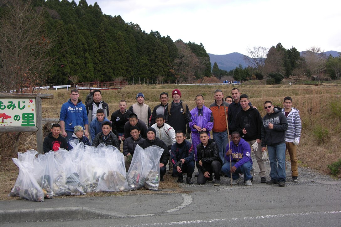 7 Dec 2014 - Marines, Sailors, and Civilians from Camp Fuji assist Ground Self Defense Force personnel from Takigahara Garrison with an annual cleanup of a local river.  This cleanup is part of Camp Fuji's efforts to sustain and strengthen its relationship with the surrounding community.