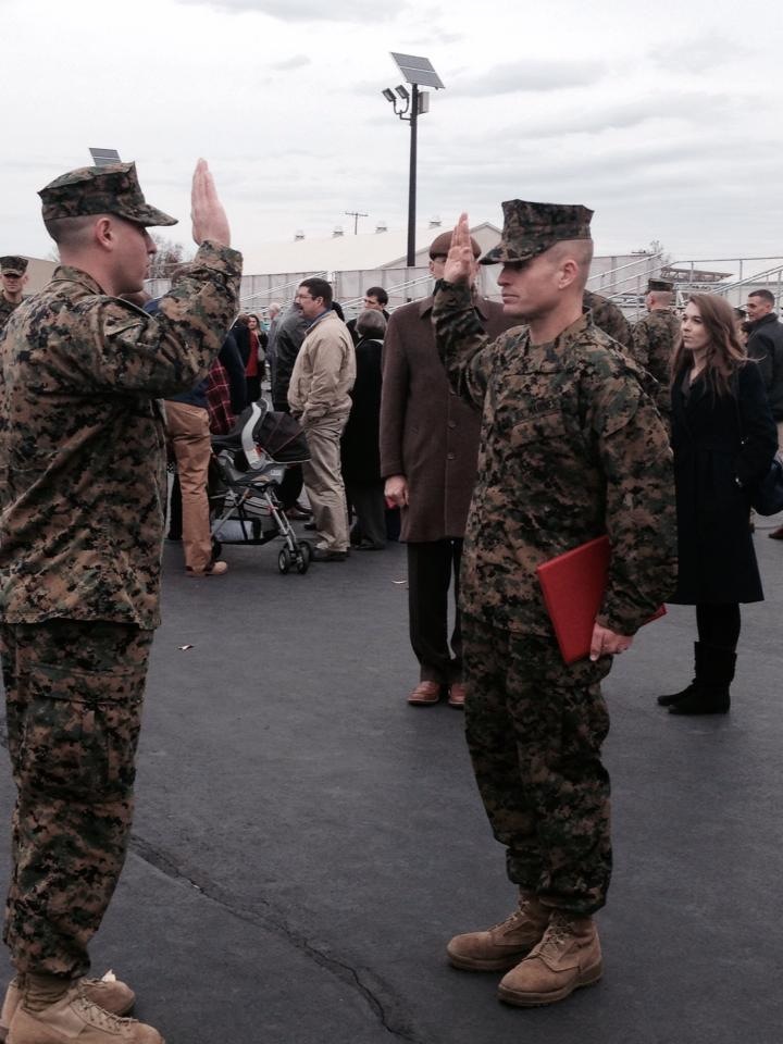 Staff Sgt. James J. W. Geiger reaffirms the oath of enlistment after his graduation from Officer Candidate Course in Quantico, Virginia, Nov. 25. Capt. Steven Valenti, operations officer, Recruiting Station Pittsburgh, administered the oath. Geiger enlisted for four more years after his OCC graduation and will accept his commission after graduating from college. (Courtesy Photo) 