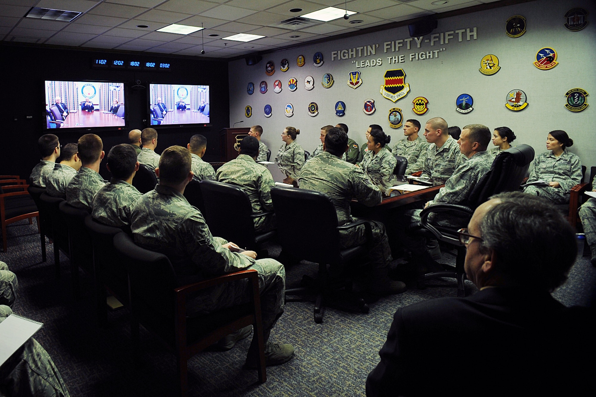 More than 30 members of the 55th Wing listen to Air Force Vice Chief of Staff Gen. Larry Spencer as he discusses the Airman Powered by Innovation program during a virtual town hall meeting Dec. 1, 2014, at Offutt Air Force Base, Neb. Offutt is the first base chosen to interact with the vice chief on the topic and he hopes that by spreading the word on this program Airmen will submit ideas that will transform the way the Air Force does business. (U.S. Air Force photo/Charles Haymond)