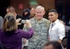 The Chairman of the Joint Chiefs of Staff, Army Gen. Martin E. Dempsey, takes a picture with an Airman during a USO holiday troop visit Dec. 8, 2014, at Incirlik Air Base, Turkey. Dempsey is on his final holiday troop visit tour visiting with Airmen serving abroad. (U.S. Air Force photo/Airman Cory W. Bush)