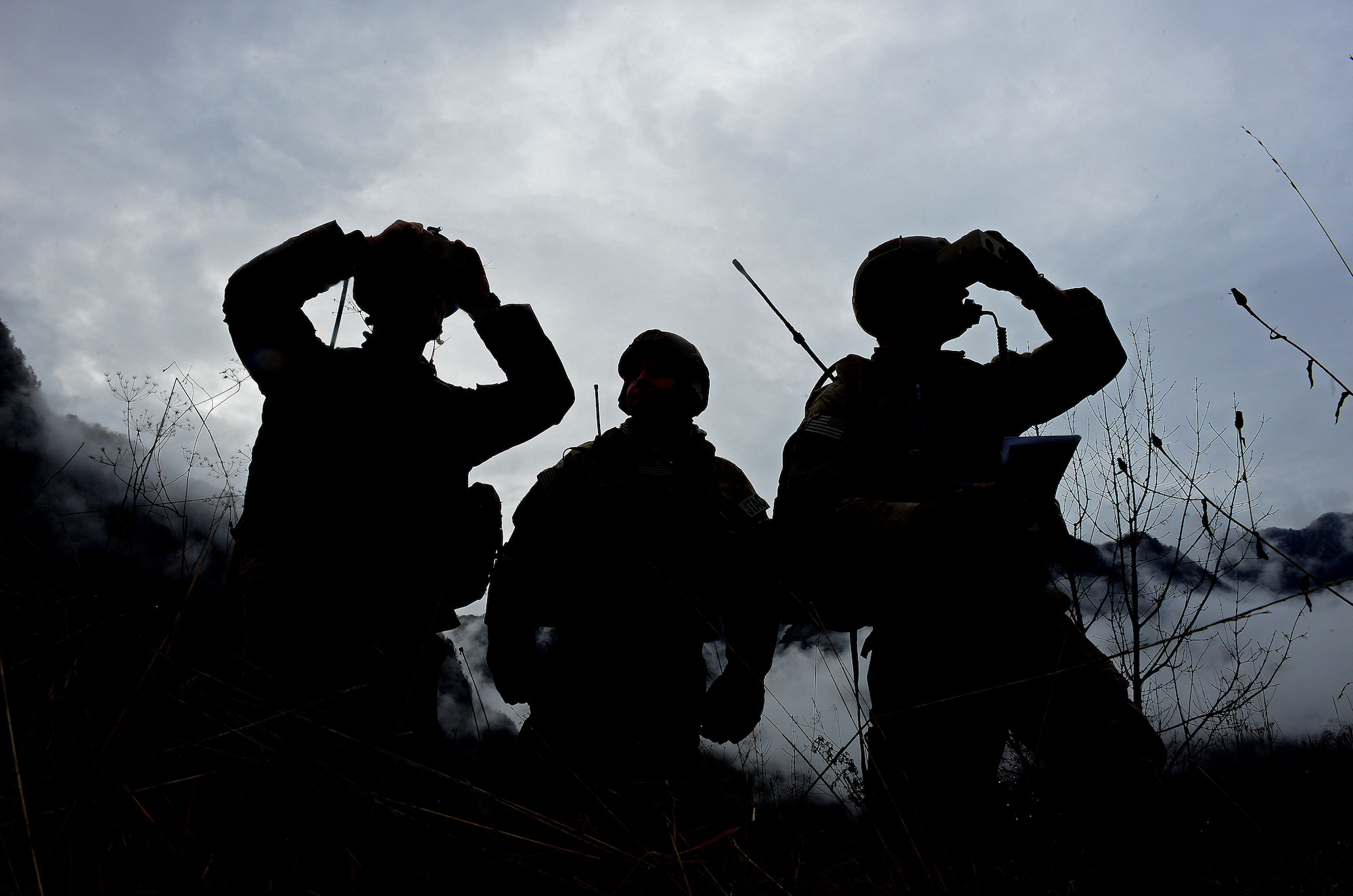 Joint tactical air controllers call in simulated airstrikes, Dec. 2, 2014, in Barcis, Italy. Trained in all types of warfare, JTACs are proficient in a variety of technology, a range of weaponry, and can advise and support ground commanders. The JTACs are from the 2nd Air Support Operations Squadron. (U.S. Air Force photo/Senior Airman Matthew Lotz)