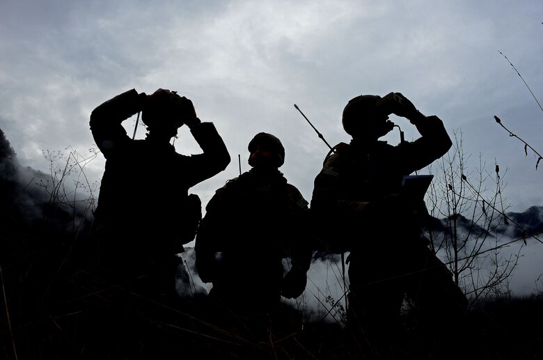 Joint tactical air controllers call in simulated airstrikes, Dec. 2, 2014, in Barcis, Italy. Trained in all types of warfare, JTACs are proficient in a variety of technology, a range of weaponry, and can advise and support ground commanders. The JTACs are from the 2nd Air Support Operations Squadron. (U.S. Air Force photo/Senior Airman Matthew Lotz)