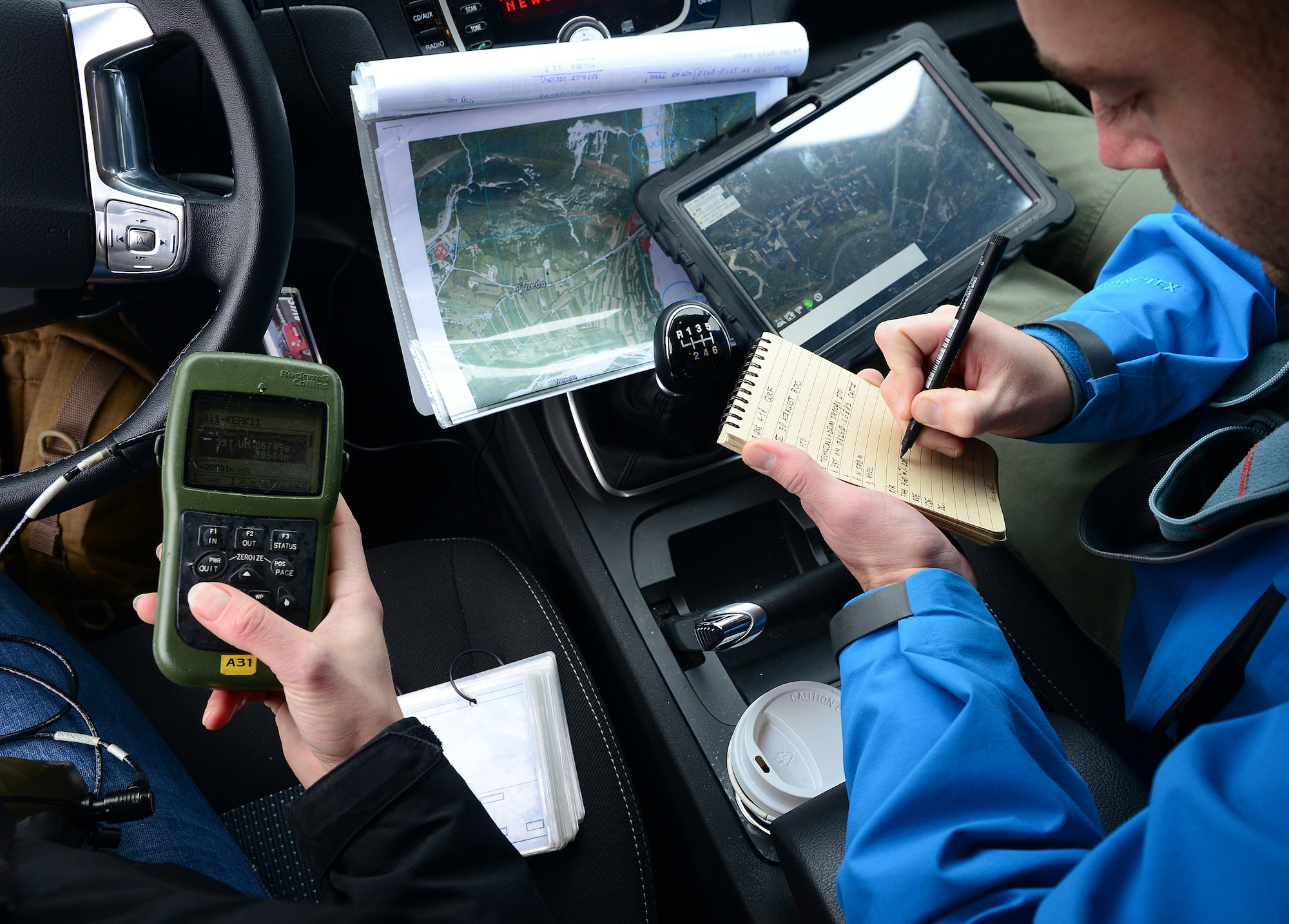 Royal Netherlands army joint tactical air controllers write down coordinates for a simulated target, Dec. 4, 2014, in Barcis, Italy. During a week-long exercise, U.S. and Dutch JTACs trained with 555th Fighter Squadron pilots to stay current in their proficiencies. (U.S. Air Force photo/Senior Airman Matthew Lotz)