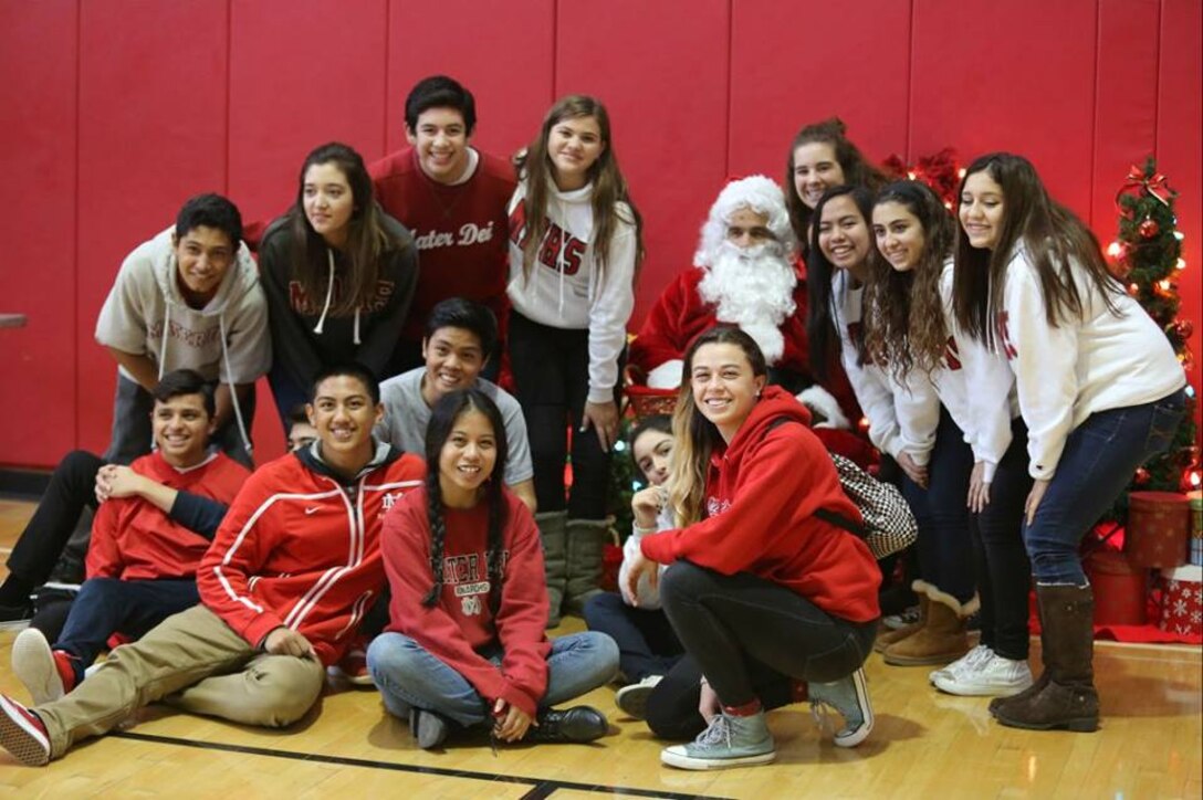 CAMP PENDLETON, Calif. - Around 200 children showed up at the Paige Fieldhouse with their parents to have lunch with Santa, Dec. 6. The event was put on by Marine Corps Community Services with volunteers from the Mater Dei High School. (Photo by Lance Cpl. Asia Sorenson)