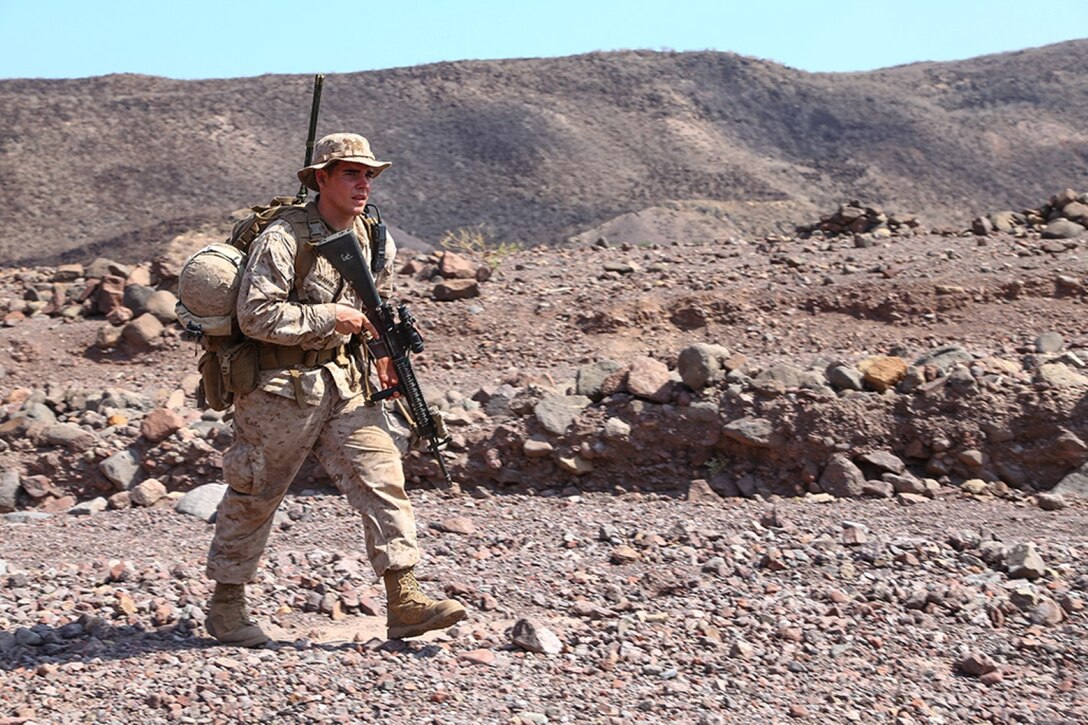 A Marine with Golf Company, Battalion Landing Team 2nd Battalion, 1st Marines, 11th Marine Expeditionary Unit (MEU), patrols during sustainment training in D'Arta Plage, Djibouti, Dec. 6. The Makin Island Amphibious Ready Group (ARG) and the embarked 11th MEU provide a versatile, sea-based, expeditionary force that can be tailored to a variety of missions in the U.S. 5th Fleet area of responsibility. (U.S. Marine Corps photo by Cpl. Laura Y. Raga/Released) 