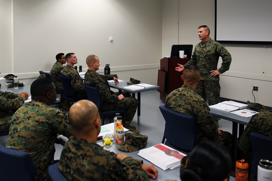 Sgt. Maj. Benjamin L. Pangborn speaks with students attending the Equal Opportunity Representative Course at Marine Corps Air Station Cherry Point, N.C., Dec. 4, 2014. More than 25 Marines from all across the East Coast attended the course. Pangborn is the sergeant major of Cherry Point.