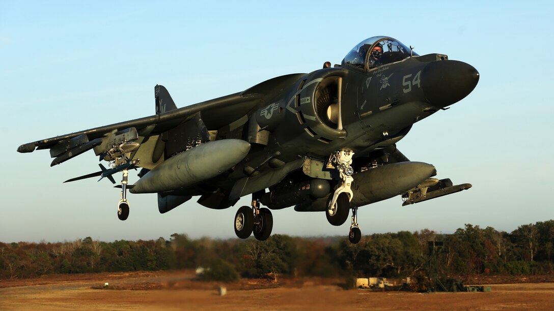 Maj. James S. Tanis lands an AV-8B Harrier during field carrier landing practice sustainment training at Marine Corps Auxiliary Landing Field Bogue, N.C., Dec. 5, 2014. Marine Attack Squadron 231 is slated to deploy with Marine Medium Tiltrotor Squadron 365 (Reinforced) during an upcoming deployment with the 24th Marine Expeditionary Unit. Tanis is a naval aviator and executive officer of VMM-365 (Rein).