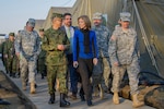 CAMP ASAKA, Japan (Dec. 8, 2014) - Lt. Gen. Koichi Isobe, the commanding general of the Japan Ground Self-Defense Force Eastern Army, talks with Caroline Kennedy, the U.S. ambassador to Japan, while touring Camp Asaka prior to Yama Sakura 67.  