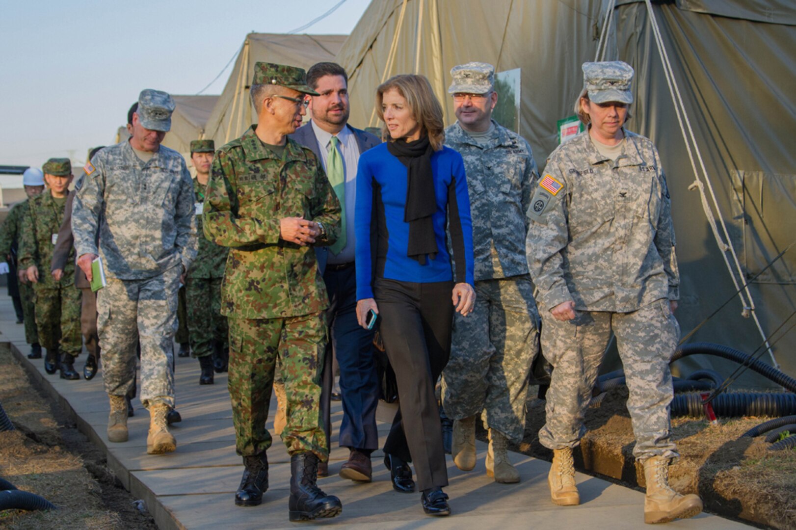 CAMP ASAKA, Japan (Dec. 8, 2014) - Lt. Gen. Koichi Isobe, the commanding general of the Japan Ground Self-Defense Force Eastern Army, talks with Caroline Kennedy, the U.S. ambassador to Japan, while touring Camp Asaka prior to Yama Sakura 67.  