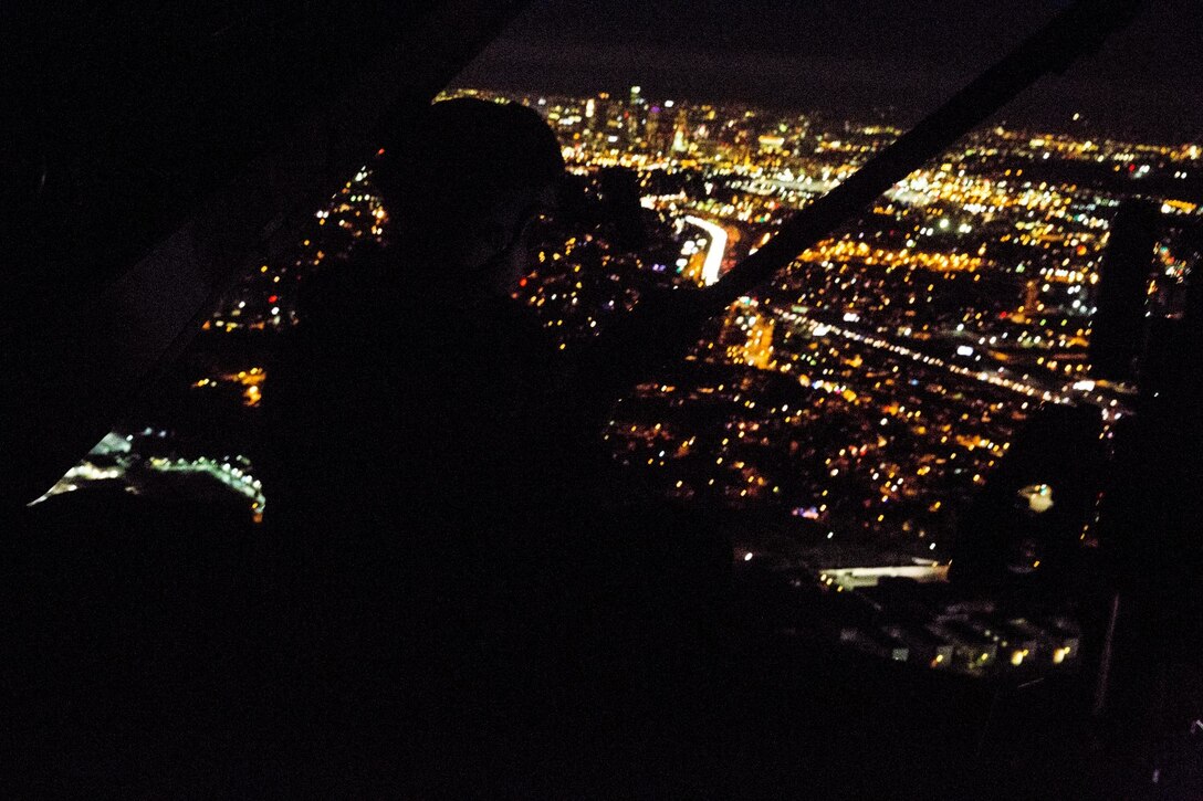U.S. Marines with the 15th Martine Expeditionary Unit’s Maritime Raid Force conduct a raid during realistic urban training at Dodger Stadium in Los Angeles Dec. 8, 2014. RUT prepares the Marines of the 15th MEU for their upcoming deployment by enhancing their combat skills in environments they may encounter in future missions. (U.S. Marine Corps photo by Cpl. Anna Albrecht/Released)