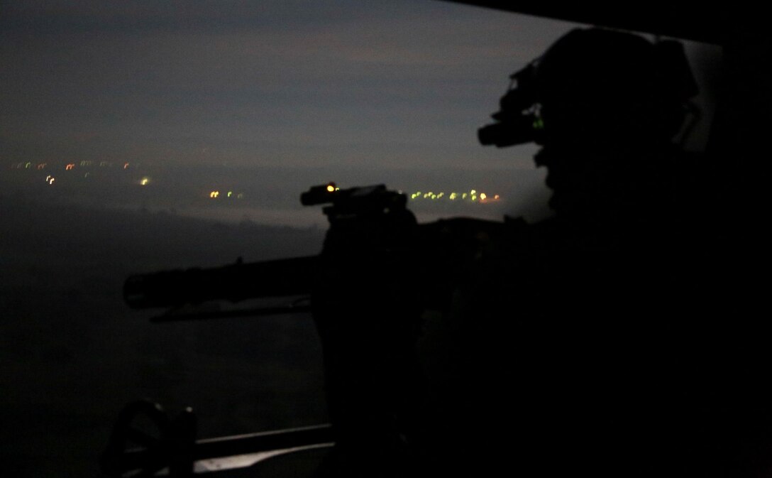 A U.S. Marine with Marine Medium Tiltrotor Squadron 161 (Reinforced), 15th Marine Expeditionary Unit, provides security during a tactical recovery of aircraft and personnel mission during realistic urban training aboard Camp Roberts, Calif., Dec. 7, 2014. RUT prepares the 15th MEU's Marines for their upcoming deployment, enhancing their combat skills in environments similar to those they may find in future missions. (U.S. Marine Corps Photo by Cpl. Steve H. Lopez/Released)