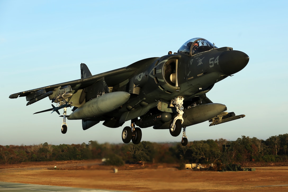 Maj. James S. Tanis lands an AV-8B Harrier during field carrier landing practice sustainment training at Marine Corps Auxiliary Landing Field Bogue, N.C., Dec. 5, 2014. Marine Attack Squadron 231 is slated to deploy with Marine Medium Tiltrotor Squadron 365 (Reinforced) during an upcoming deployment with the 24th Marine Expeditionary Unit. Tanis is a naval aviator and executive officer of VMM-365 (Rein).