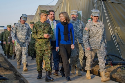 CAMP ASAKA, Japan (Dec. 8, 2014) - Lt. Gen. Koichi Isobe, the commanding general of the Japan Ground Self-Defense Force Eastern Army, talks with Caroline Kennedy, the U.S. ambassador to Japan, while touring Camp Asaka prior to Yama Sakura 67.  