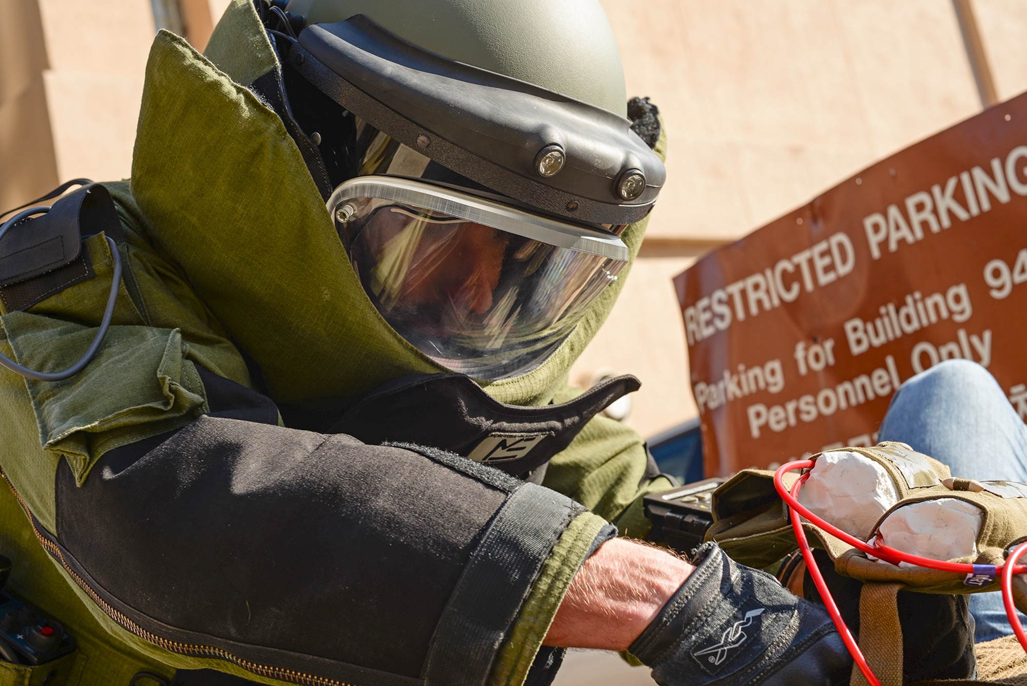 Staff Sgt. Quentin Tubbs, 51st Civil Engineer Squadron Explosive Ordnance Disposal, diffuses a simluated IED during a scenario for exercise Beverly Bulldog 15-01 Dec. 9, 2014, at Osan Air Base, Republic of Korea. Beverly Bulldog 15-01 is a peninsula-wide ORE designed to test American forces mission readiness in the event of an emergency or wartime environment.(U.S. Air Force photo by Staff Sgt. Jake Barreiro)