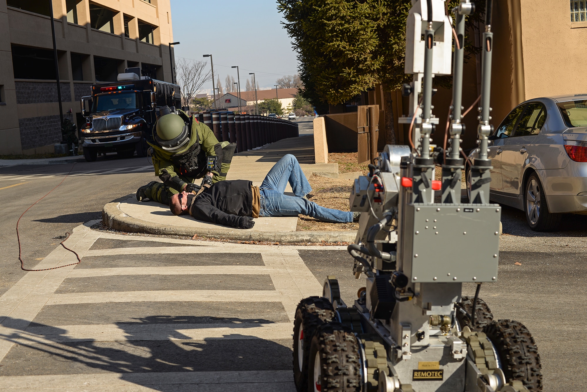 Staff Sgt. Quentin Tubbs, 51st Civil Engineer Squadron Explosive Ordnance Disposal, inspects a simulated IED during a scenario for Beverly Bulldog 15-01 Dec. 9, 2014, at Osan Air Base, Republic of Korea. Beverly Bulldog 15-01 is a peninsula-wide ORE designed to test American forces mission readiness in the event of an emergency or wartime environment.(U.S. Air Force photo by Staff Sgt. Jake Barreiro)