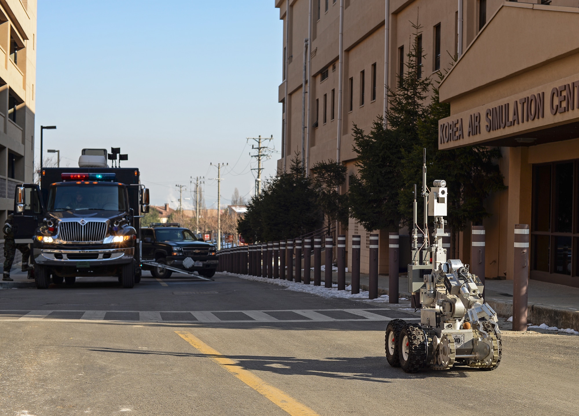 The Explosive Ordnance Disposal team responds to a simulated IED scenario during exercise Beverly Bulldog 15-01 Dec. 9, 2014, at Osan Air Base, Republic of Korea.Beverly Bulldog 15-1 is a peninsula-wide ORE designed to test American forces mission readiness in the event of an emergency or wartime environment. (U.S. Air Force photo by Staff Sgt. Jake Barreiro)